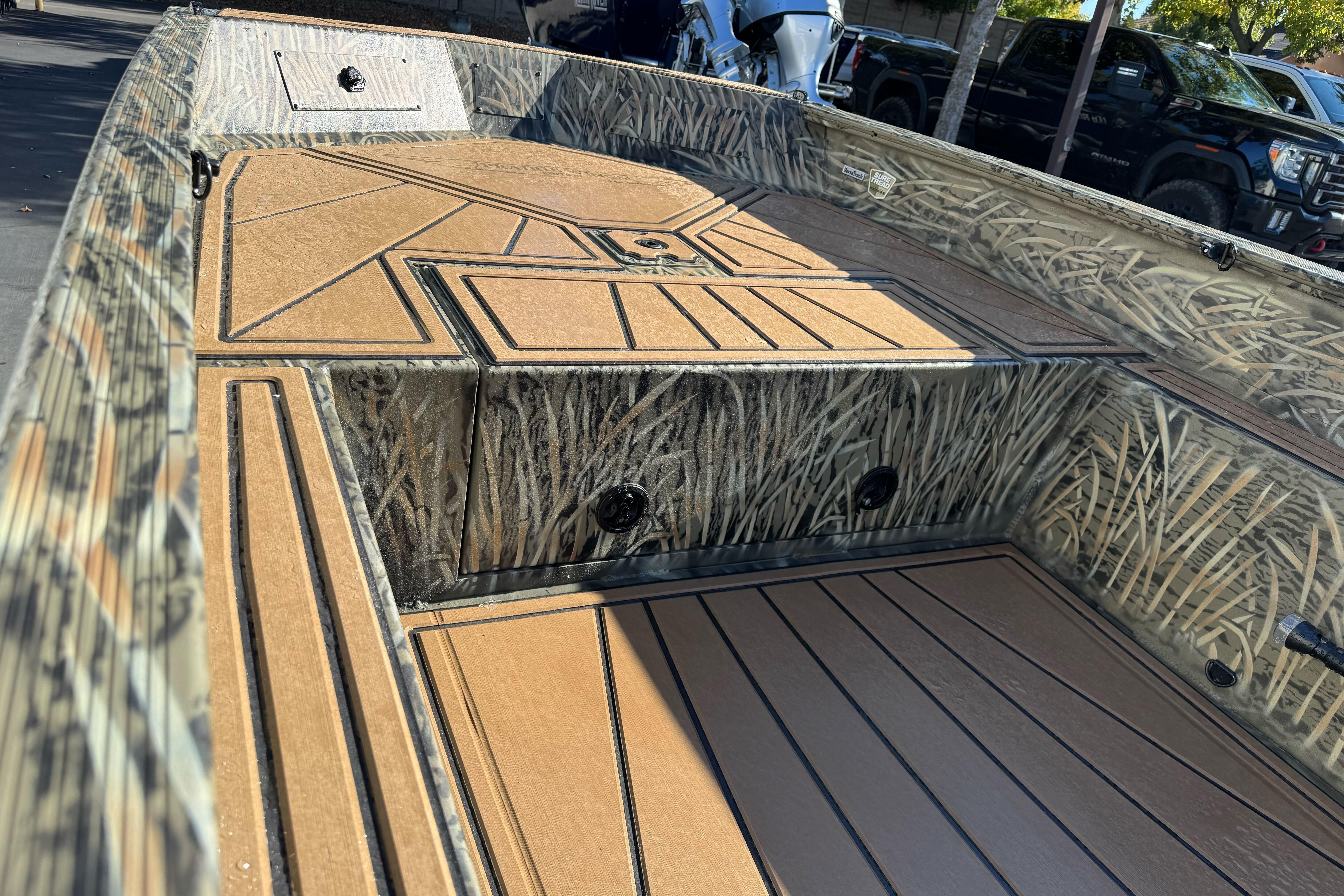 2026 Tracker Grizzly 1650 T Prairie Wings Edition boat interior with camo design.