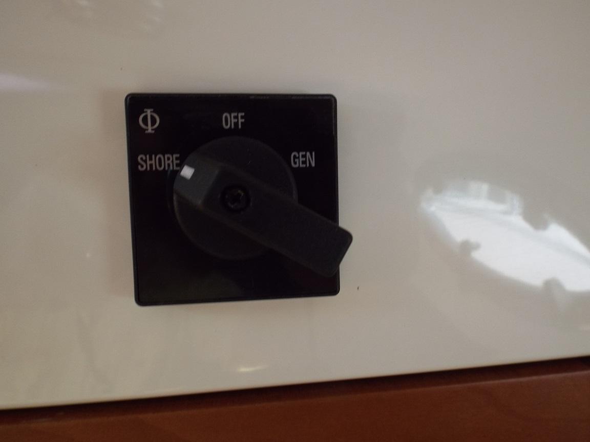 Shore power and gen power switch