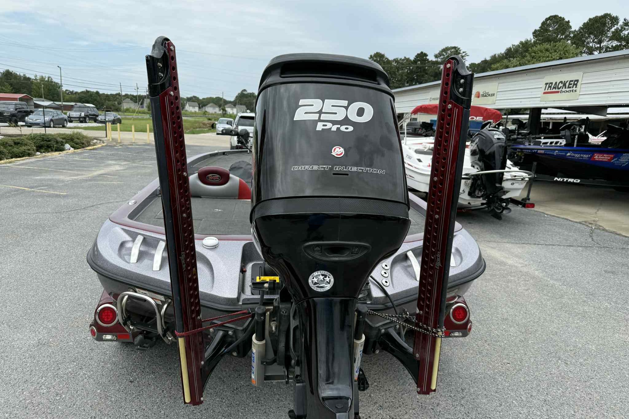 2014 Ranger Z521 Comanche boat with 250 Pro engine in a dealership lot.