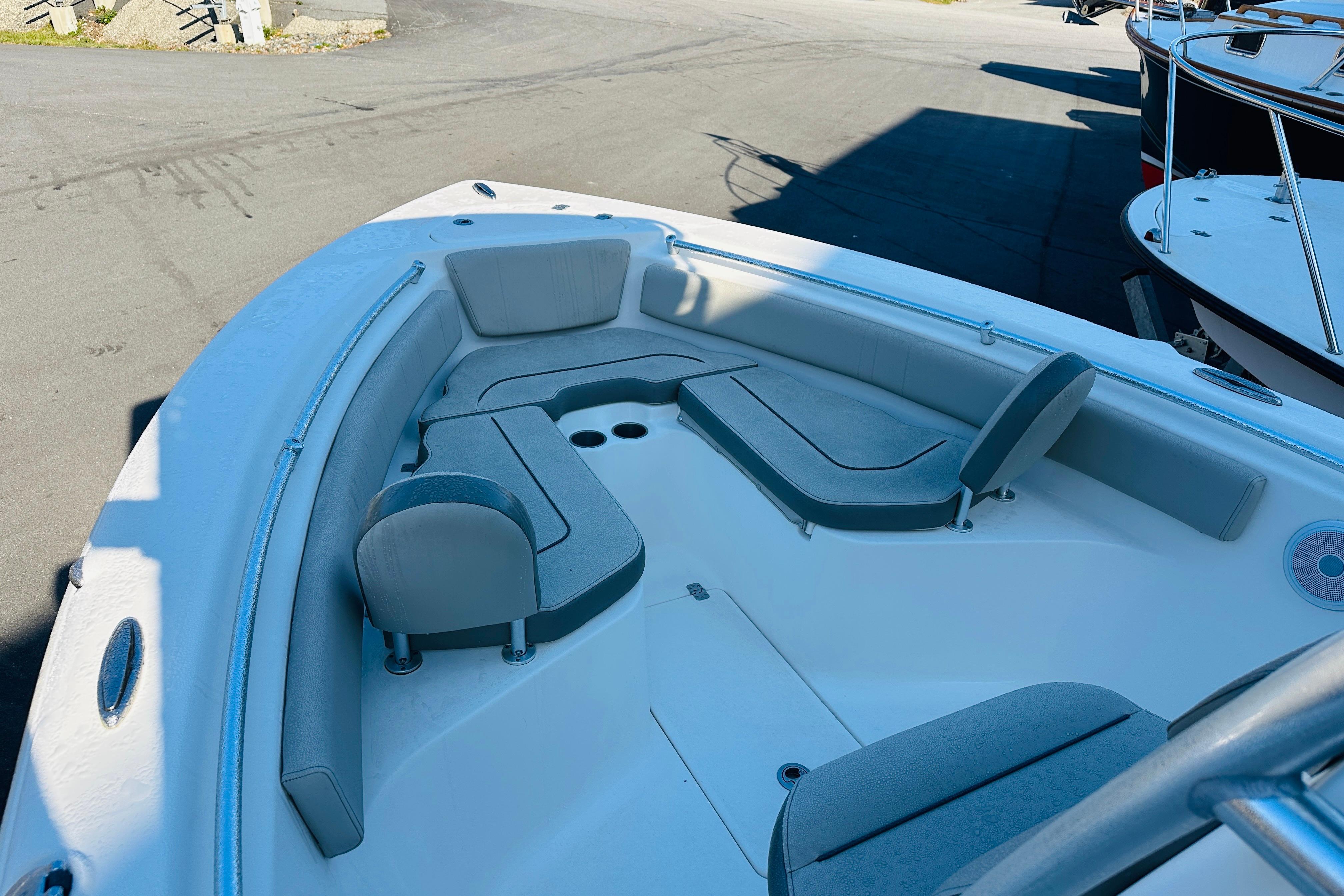 2022 Key West 239 FS boat interior with cushioned seating and spacious layout.