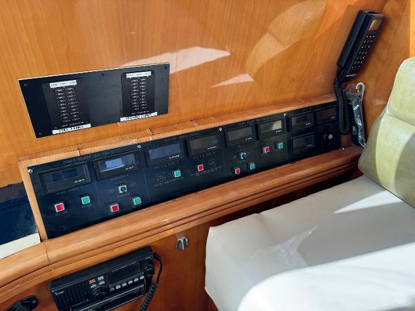 Control panel of a 1987 Bayliner 3888 Motoryacht with communication equipment.