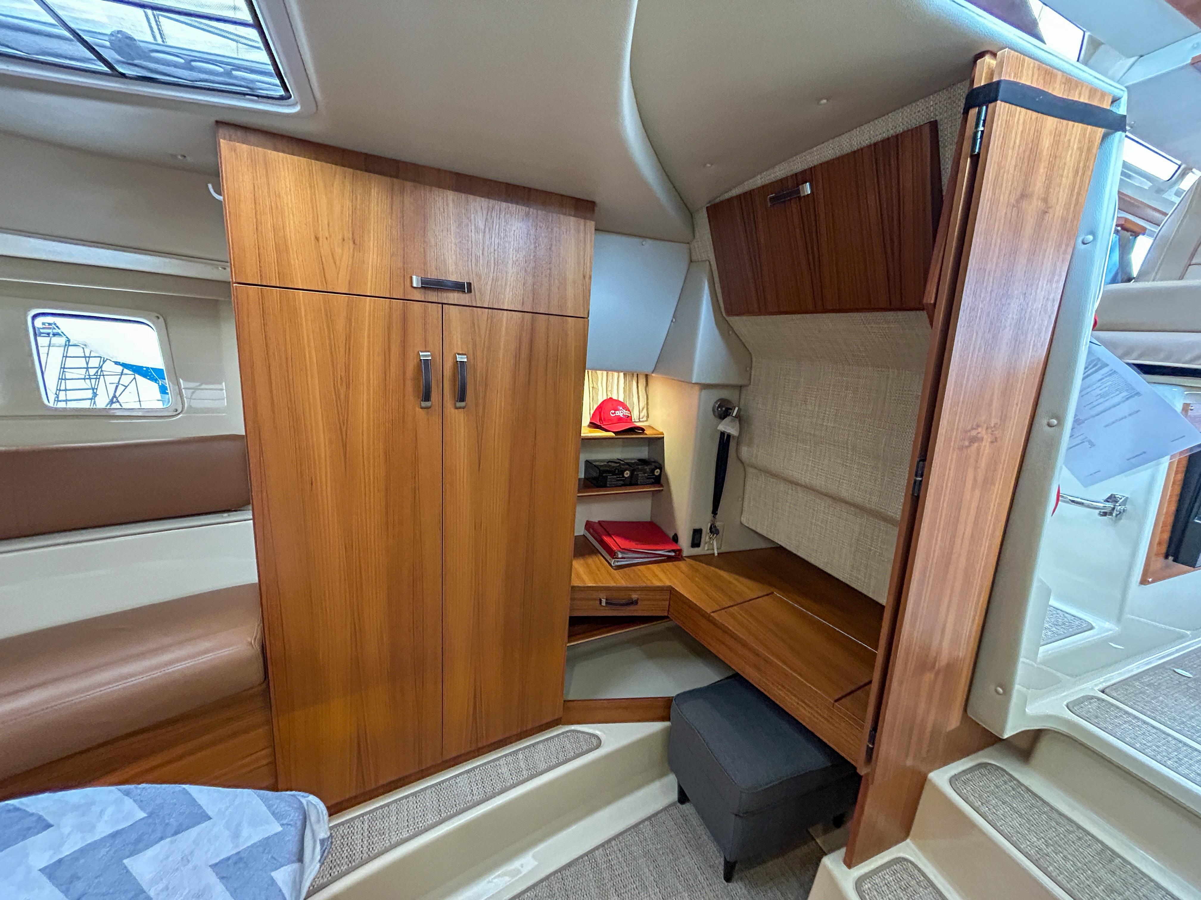 Ranger Tugs-R-43 CB 2023 -MD-US-Interior of 2023 Ranger Tugs R-43 CB, featuring wood cabinetry and seating area.-9675096 | Thumbnail
