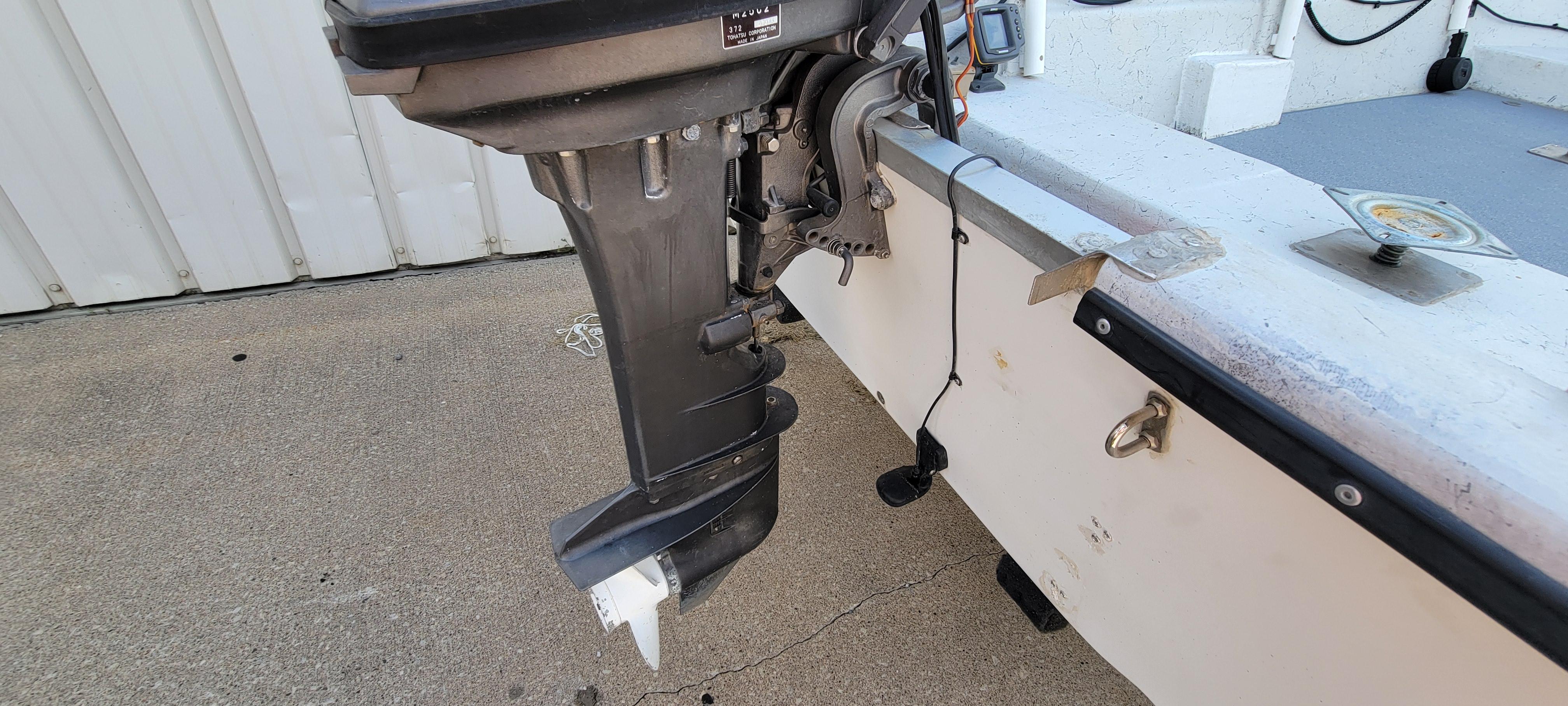 1996 Tracker Pro Angler V 16 boat motor and transom detail.