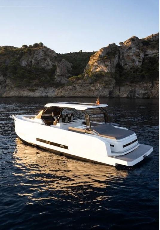 De Antonio Yachts-D36 OPEN 2024 -FL-US-2024 De Antonio Yachts D36 OPEN cruising near rocky coastline at sunset.-9090089 | Thumbnail