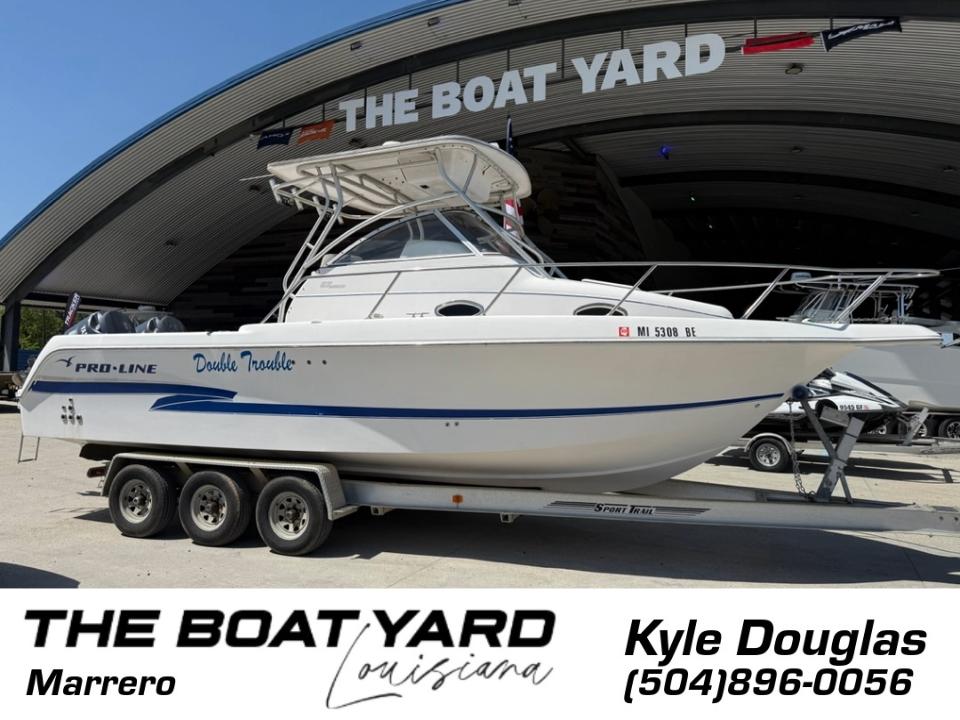 2000 Pro-Line 27 Walk boat on trailer at The Boat Yard, Marrero, Louisiana.