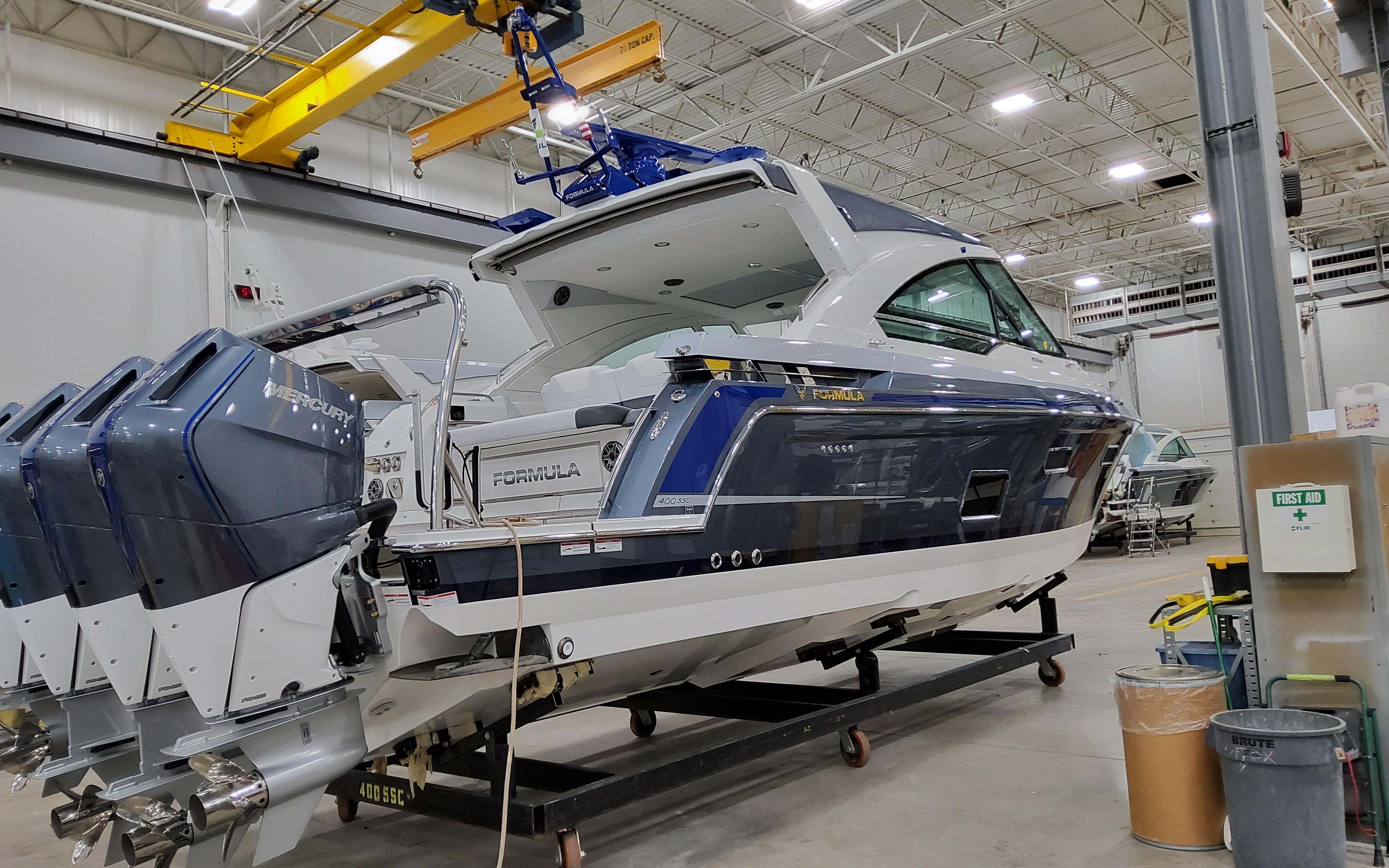 2026 Formula 400 Super Sport Crossover boat in a workshop setting.