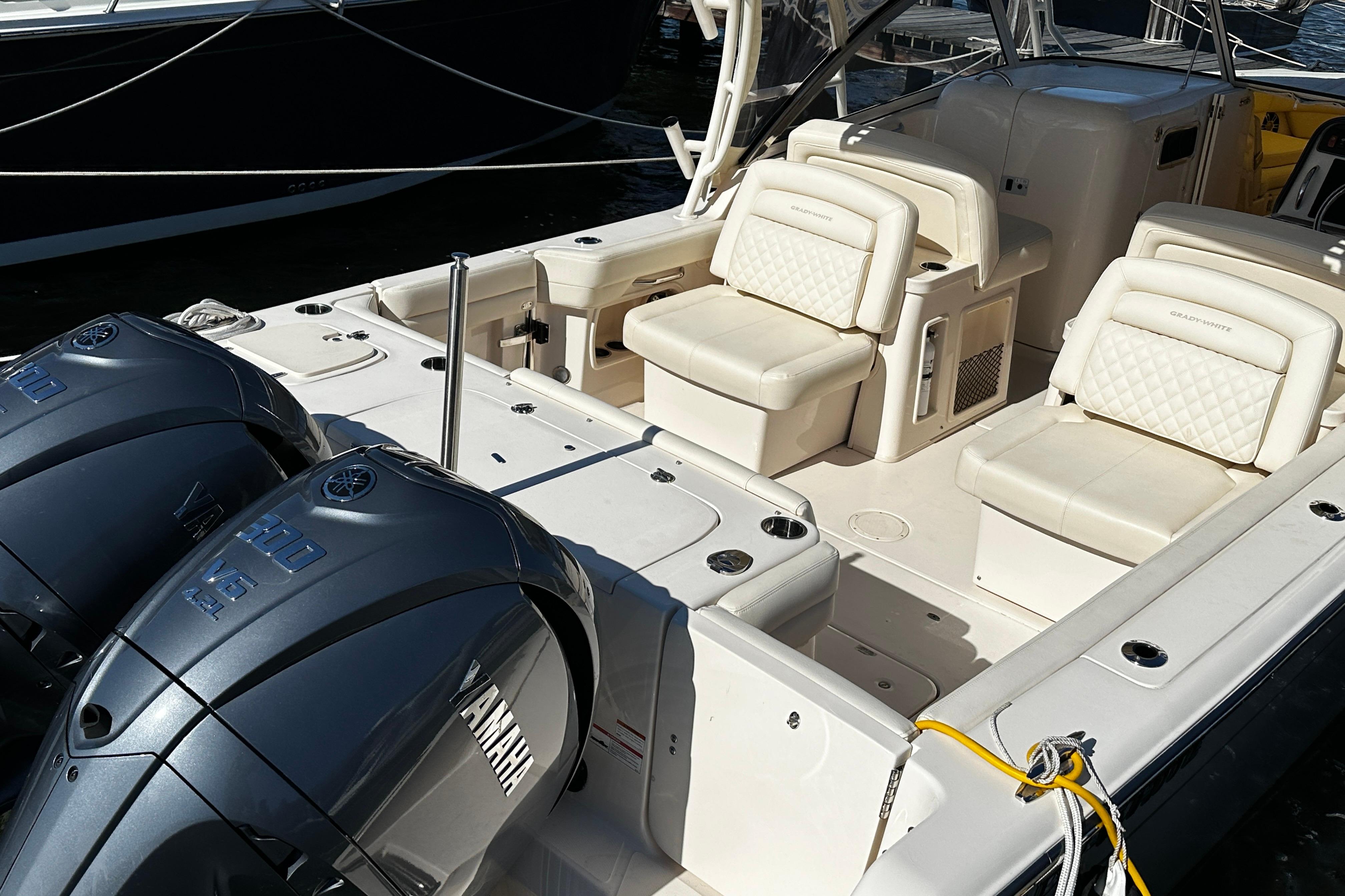 2023 Grady-White Freedom 307 boat interior with Yamaha engines, featuring luxurious seating.