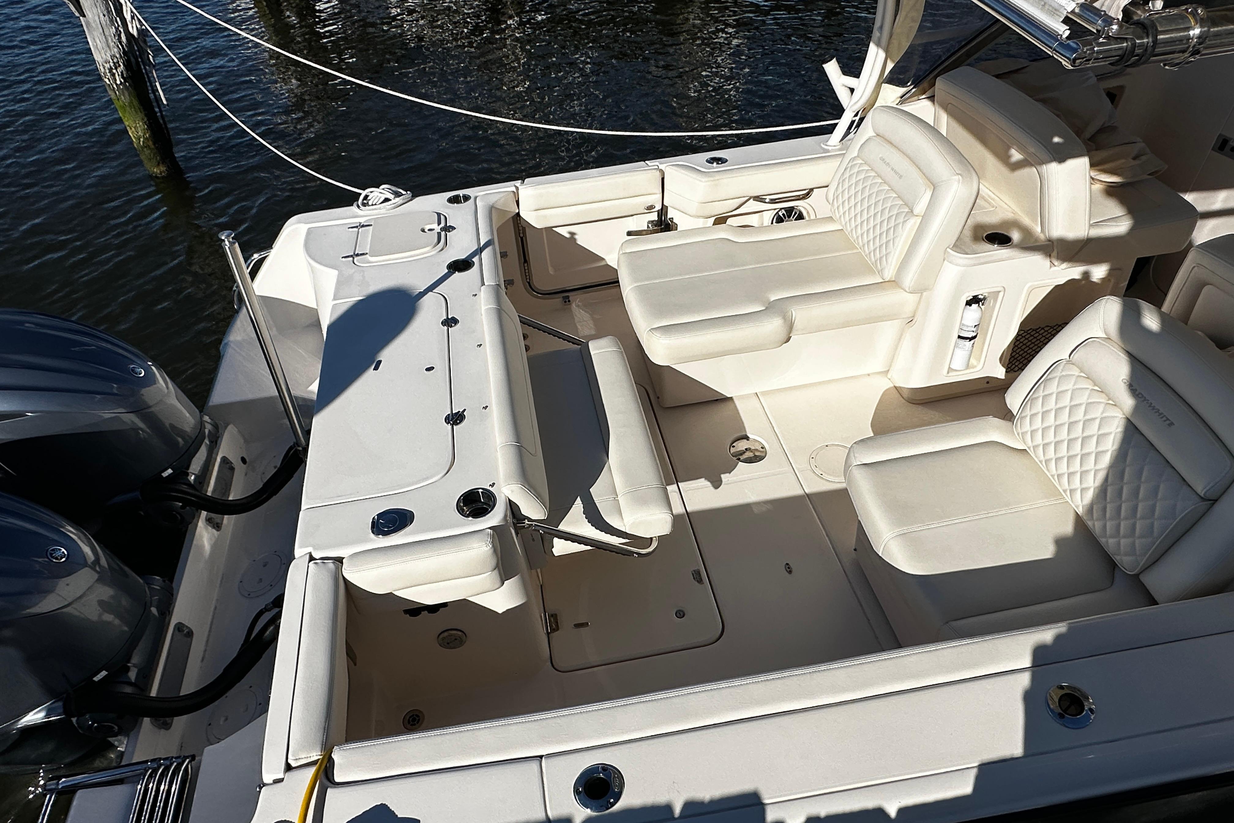 2023 Grady-White Freedom 307 boat interior with luxurious seating and dual engines.