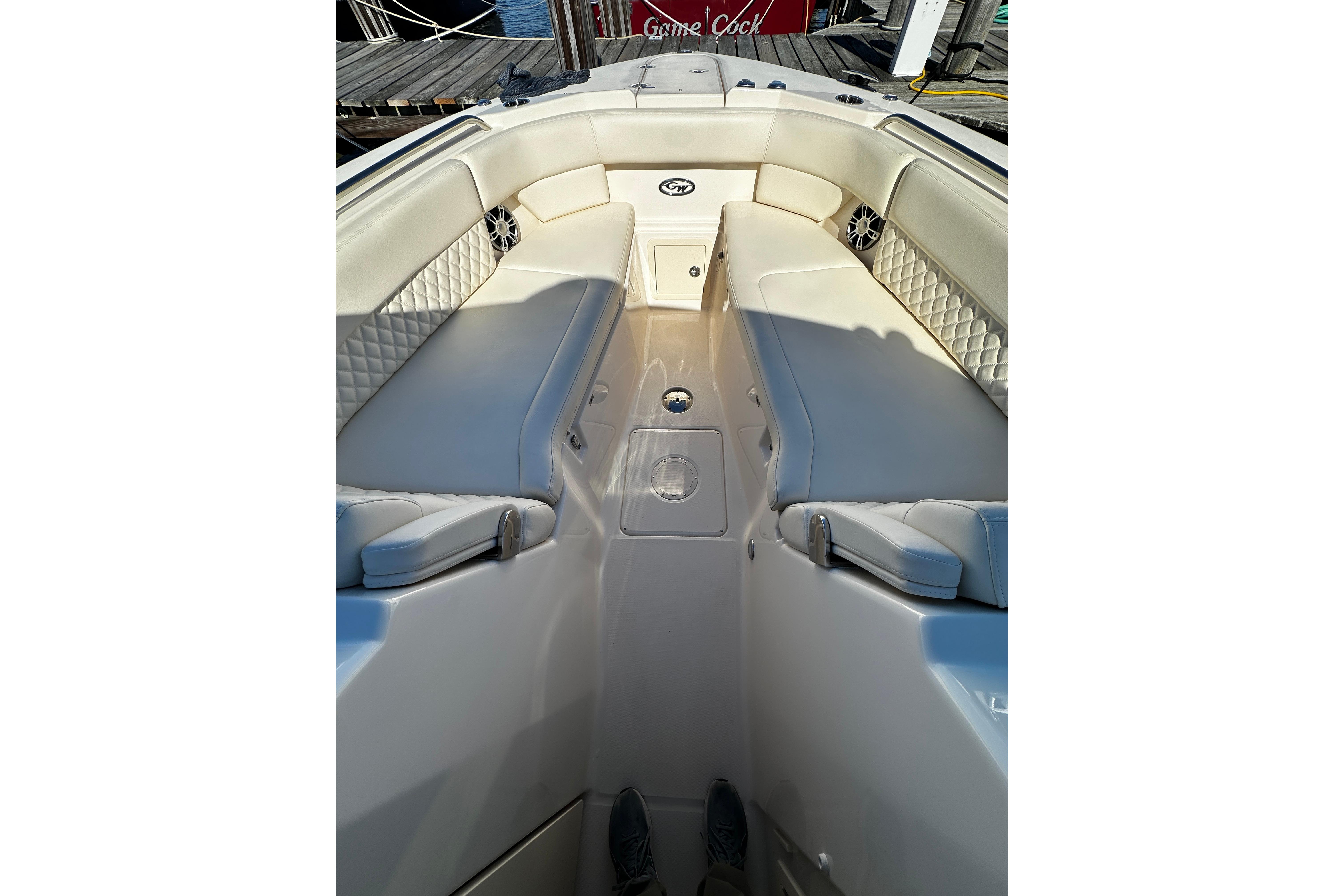 2023 Grady-White Freedom 307 boat interior with cushioned seating and sleek design.