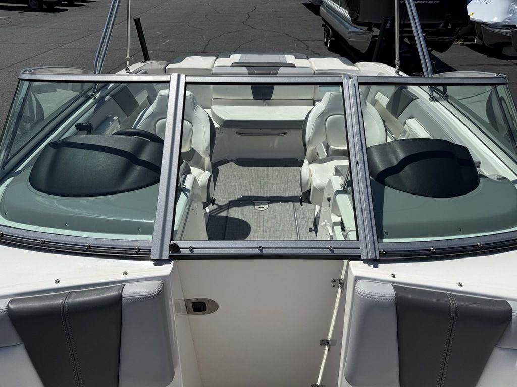 2022 Chaparral 23 SSi boat interior with seating and windshield, viewed from above.