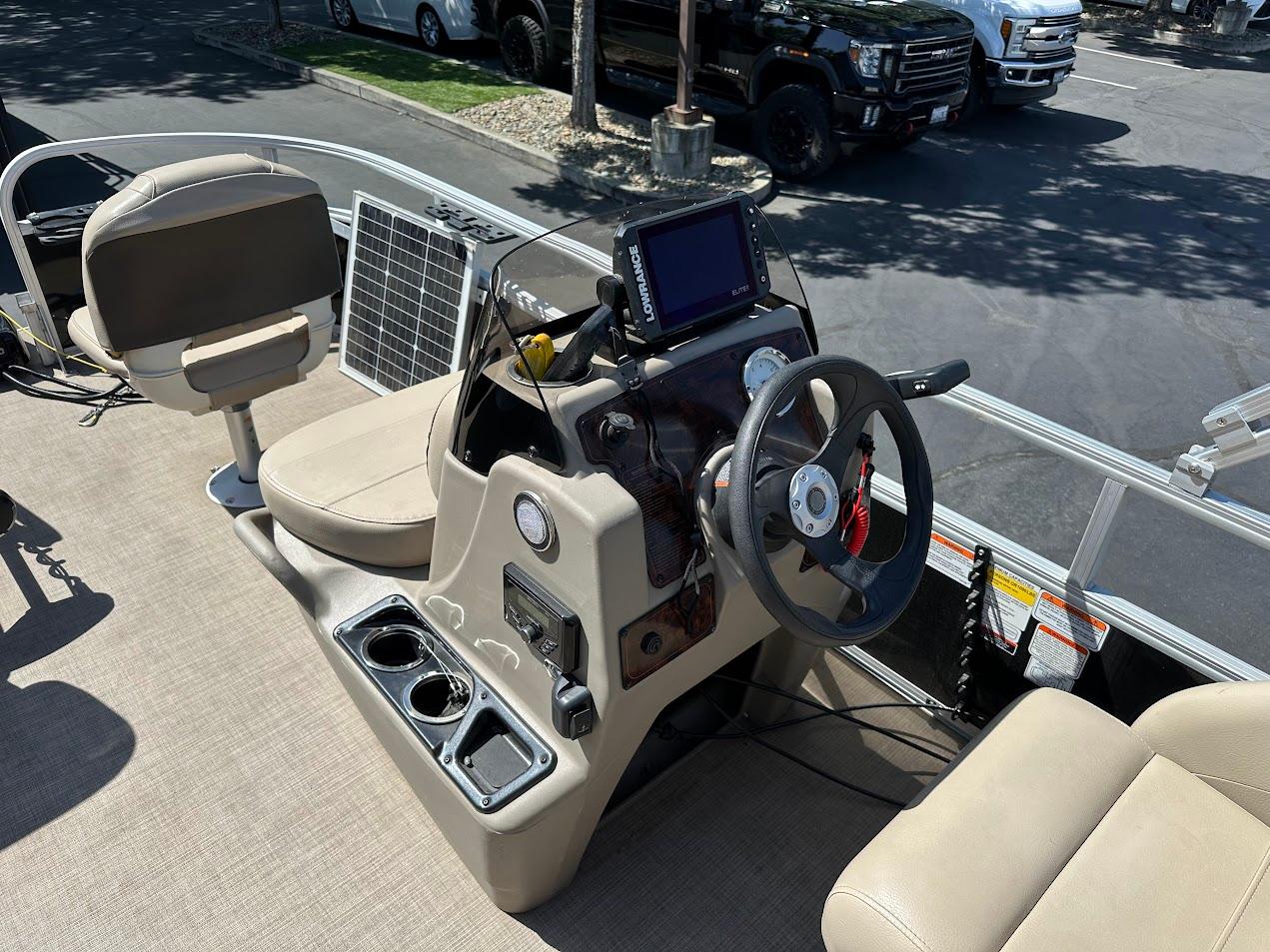2022 Sun Tracker Bass Buggy 16 XL Select boat interior with steering console and seating.