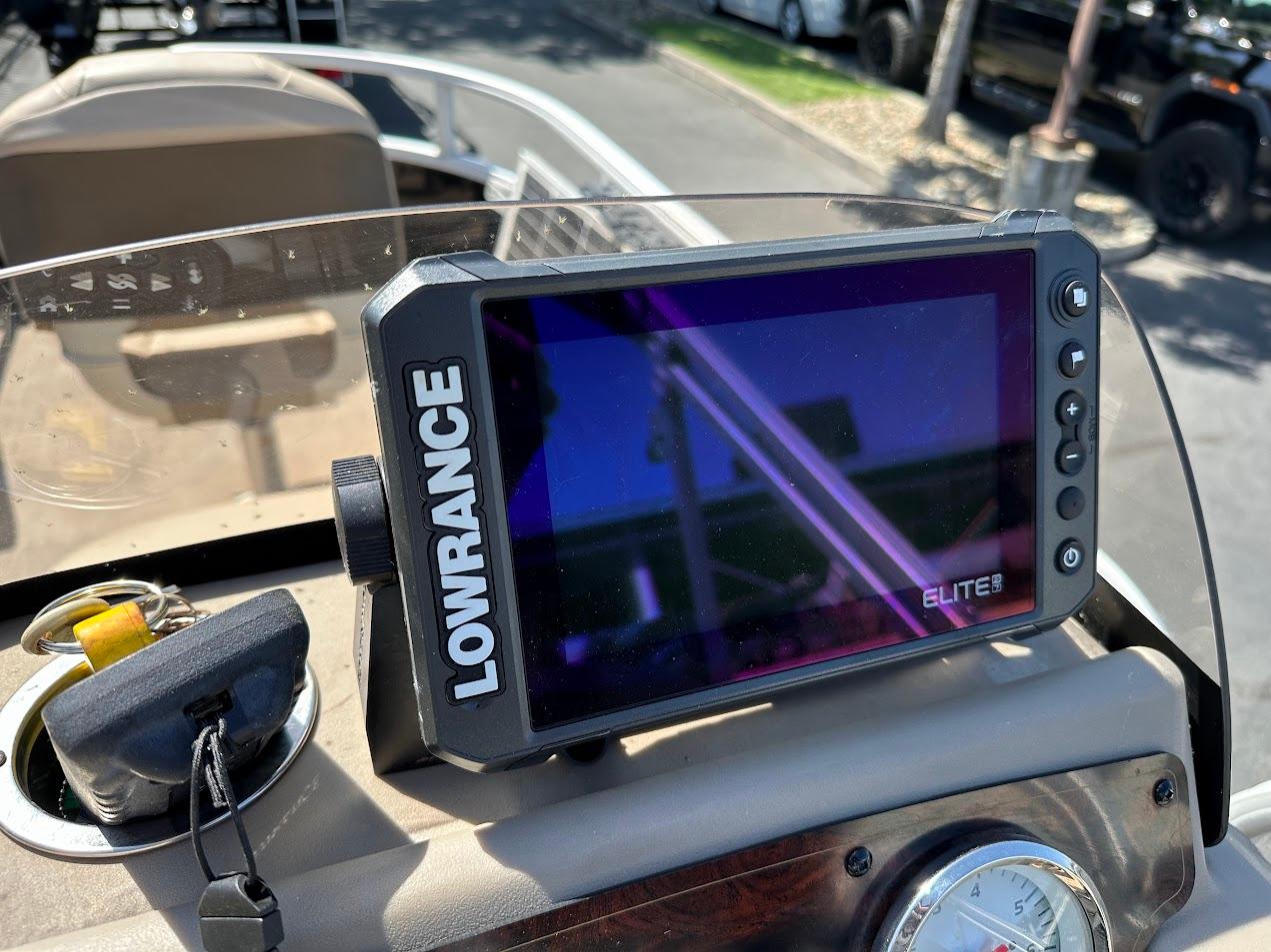 Lowrance Elite fish finder on 2022 Sun Tracker Bass Buggy 16 XL Select boat dashboard.