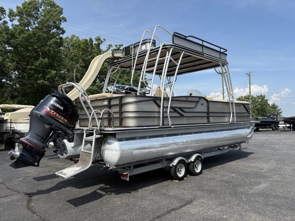 2017 Crest Classic 250L pontoon boat with Yamaha outboard motor on a trailer.