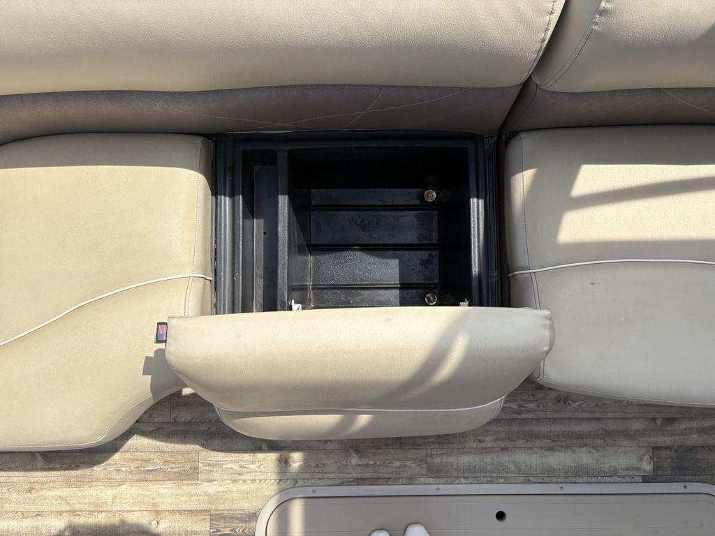 Open storage compartment in 2017 Crest Classic 250L USD CP3 boat seat.