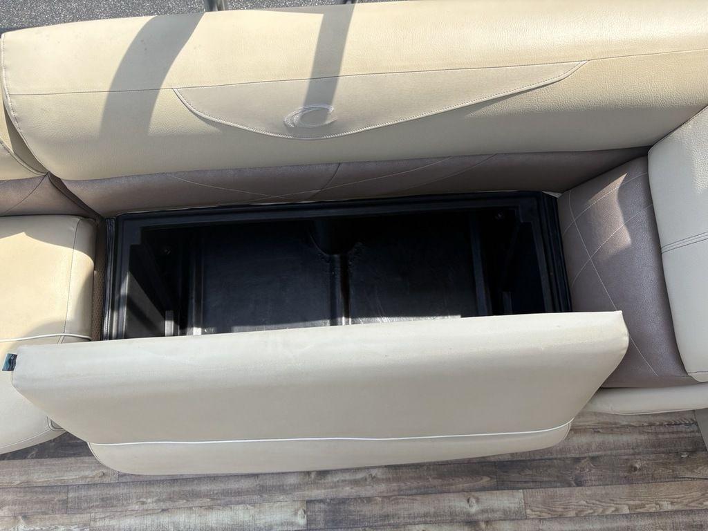 Open storage compartment in 2017 Crest Classic 250L USD CP3 boat seat.