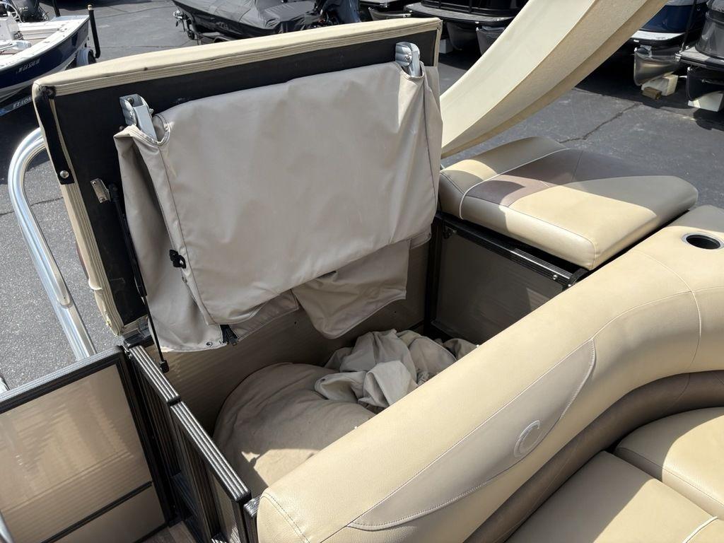2017 Crest Classic 250L USD CP3 boat interior with beige seating and storage compartment.