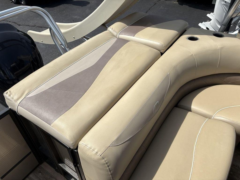 2017 Crest Classic 250L USD CP3 boat with beige and gray cushioned seating.