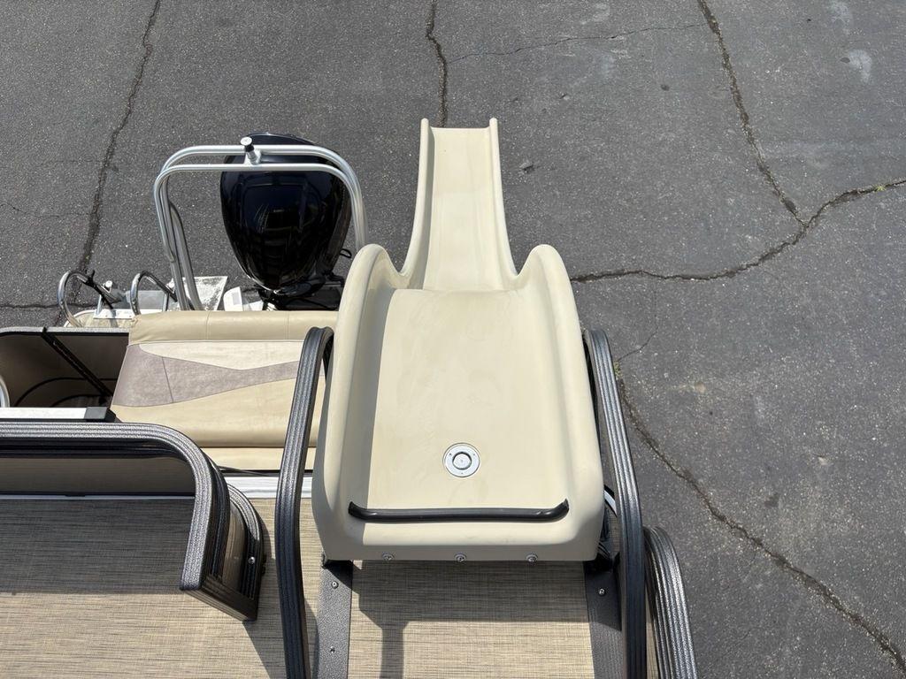 2017 Crest Classic 250L USD CP3 boat with slide and motor, viewed from above.