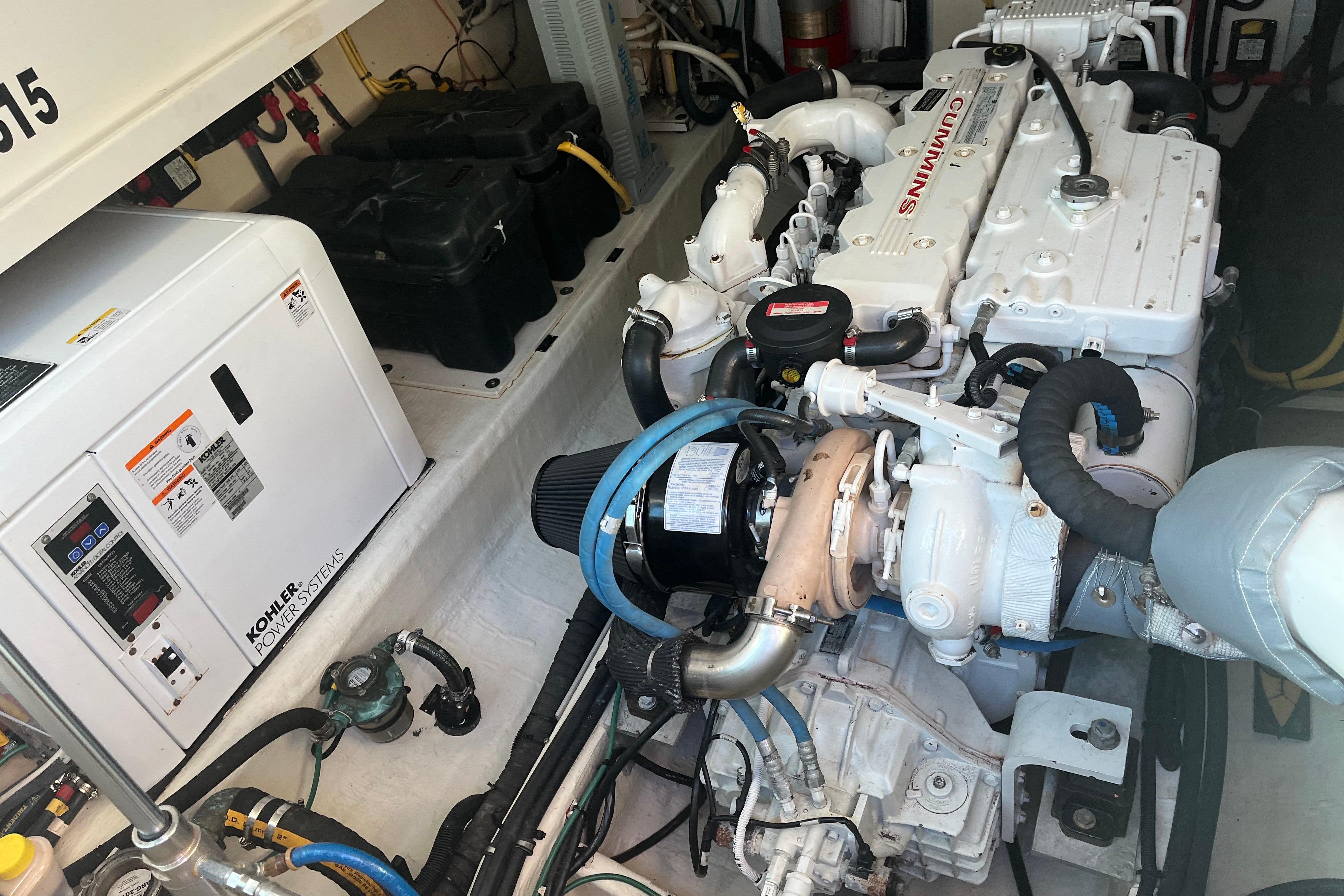 Engine room of 2010 Back Cove 33 Express Hardtop with Cummins engine and Kohler power system.