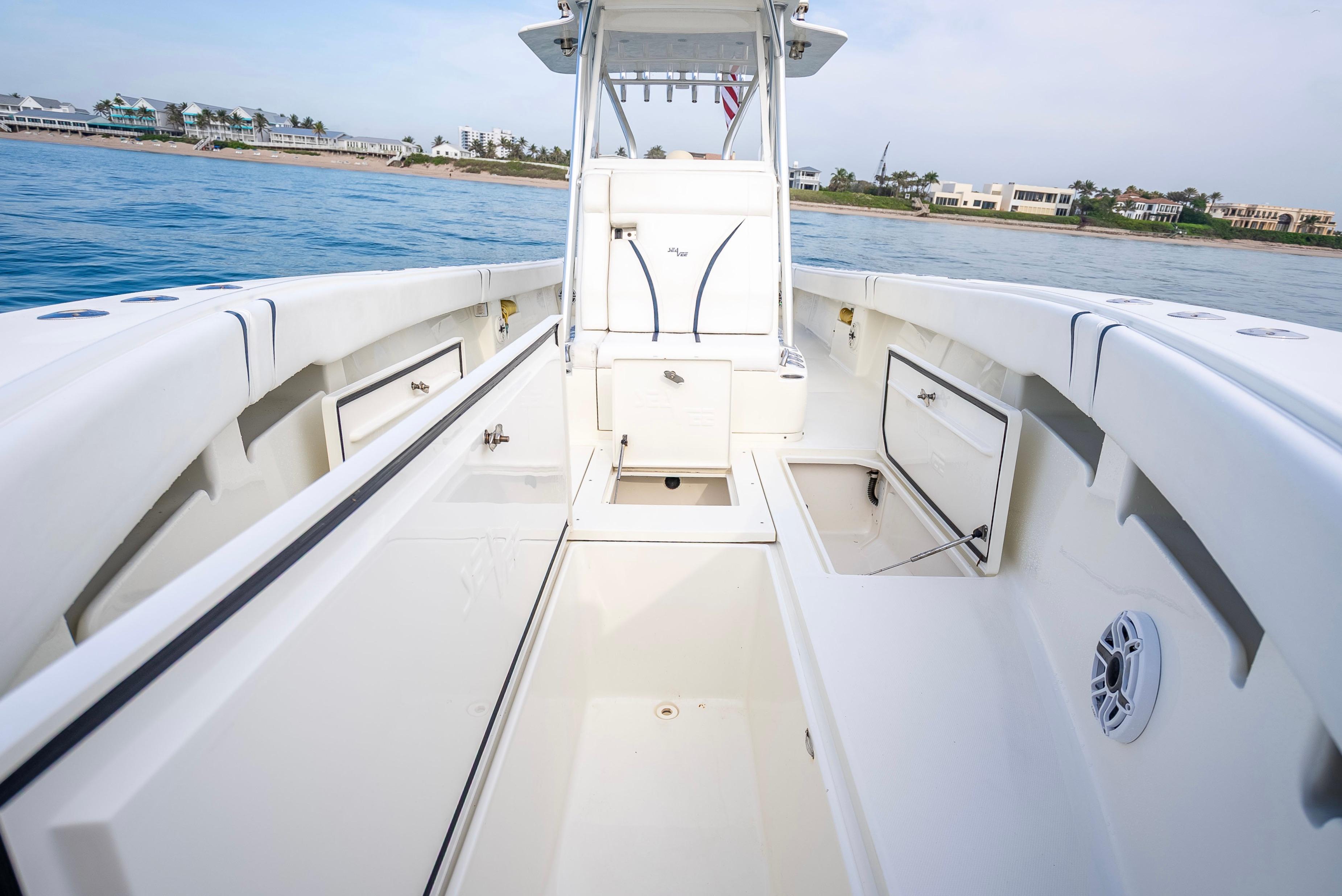 SeaVee-34 2014 -FL-US-2014 SeaVee 34 boat interior with open storage compartments, on calm blue water.-9825396 | Thumbnail