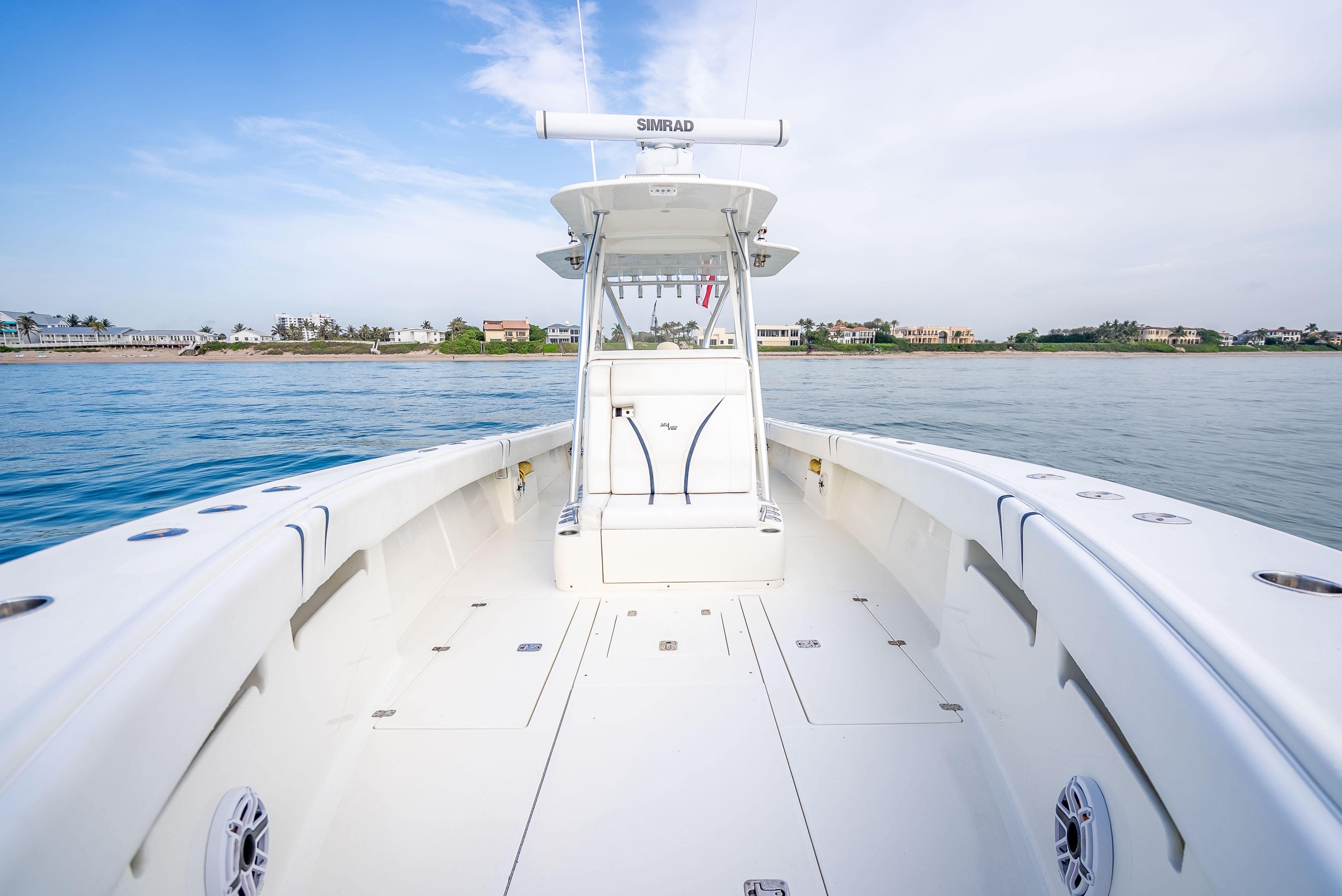 SeaVee-34 2014 -FL-US-2014 SeaVee 34 boat on calm water, showcasing spacious deck and modern design.-9825396 | Thumbnail