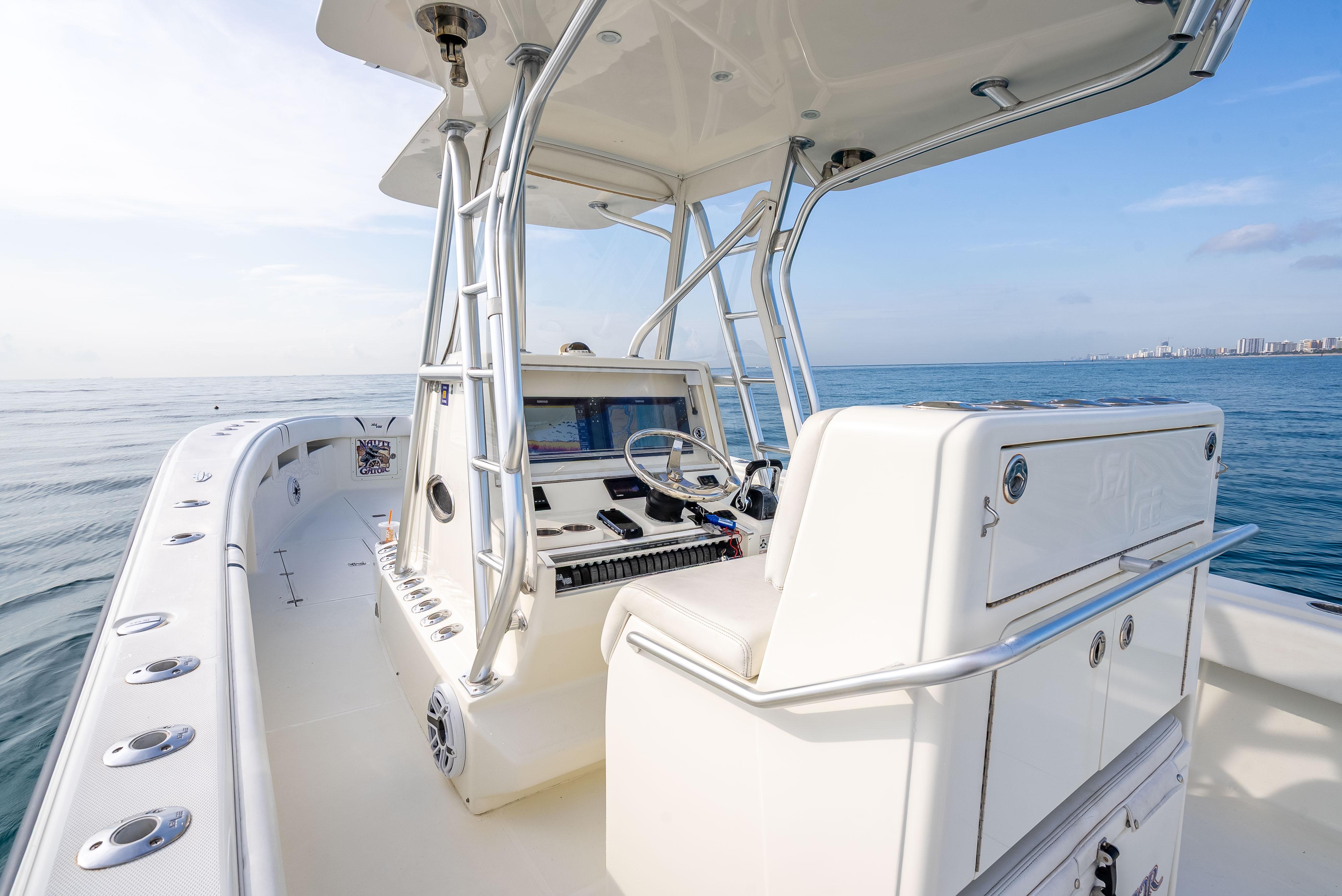SeaVee-34 2014 -FL-US-2014 SeaVee 34 boat on open water, featuring a sleek console and spacious deck.-9825396 | Thumbnail