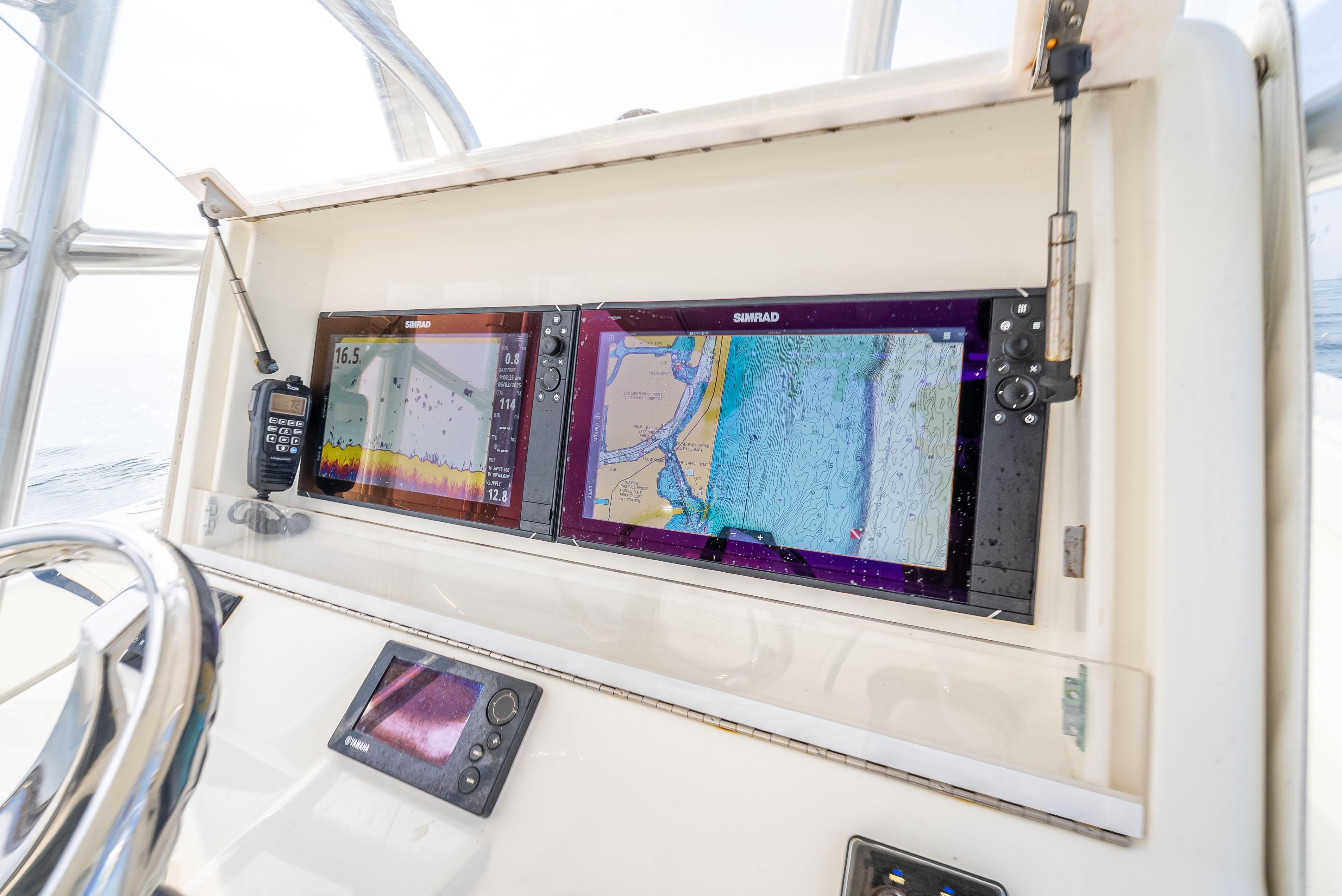 SeaVee-34 2014 -FL-US-2014 SeaVee 34 boat dashboard with dual navigation screens and controls.-9825396 | Thumbnail