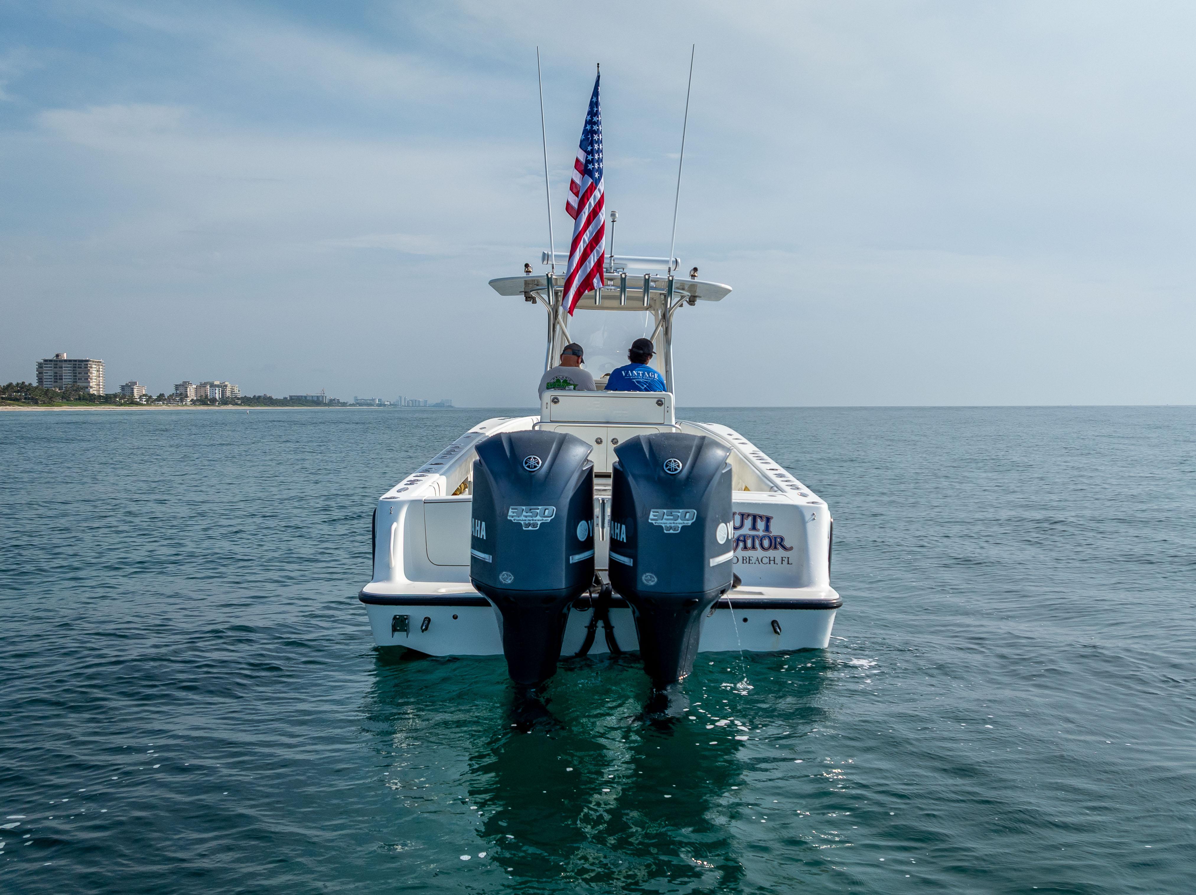 SeaVee-34 2014 -FL-US-2014 SeaVee 34 boat with dual outboard motors on calm ocean water.-9825396 | Thumbnail