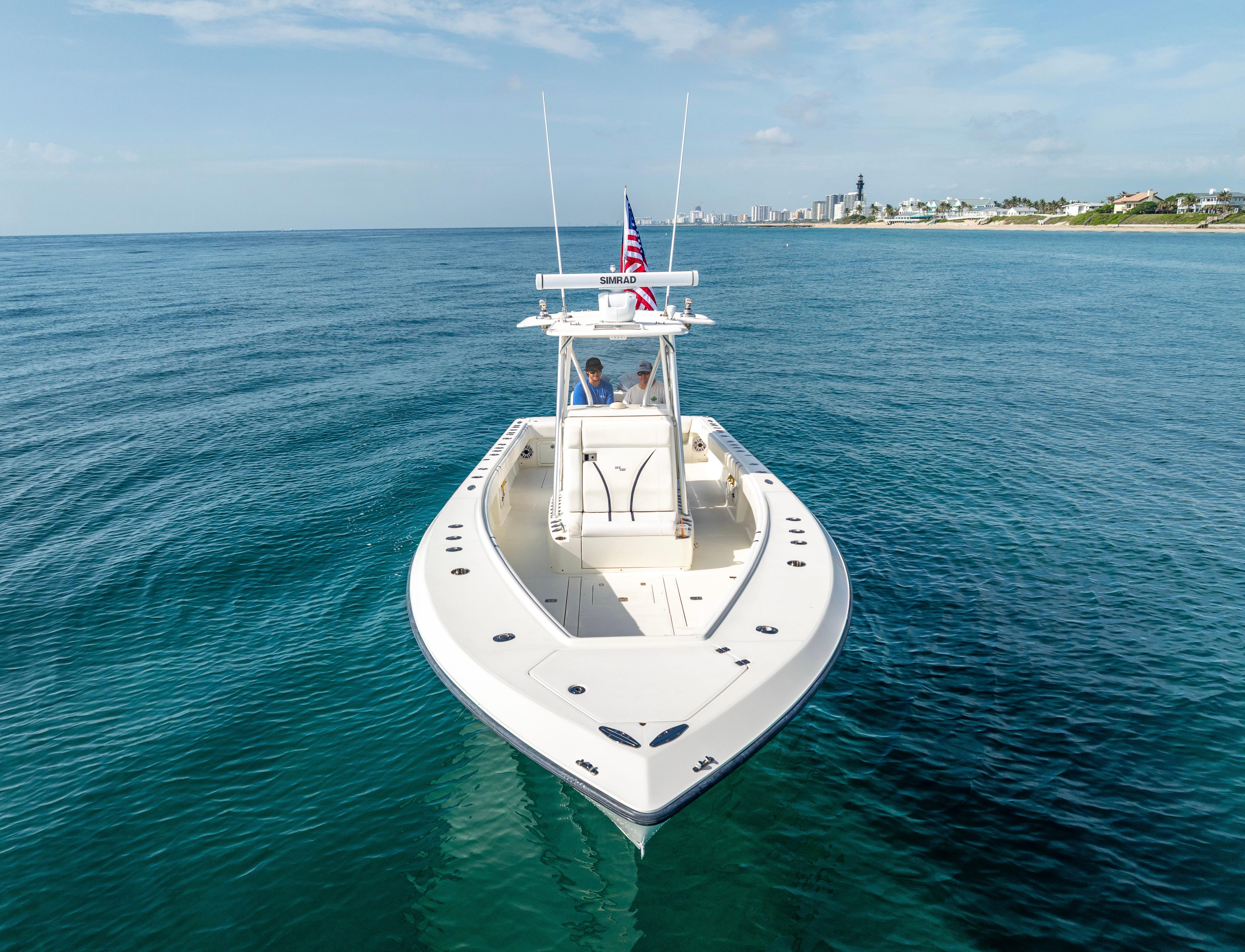 SeaVee-34 2014 -FL-US-2014 SeaVee 34 boat on calm ocean, clear sky, distant shoreline.-9825396 | Thumbnail