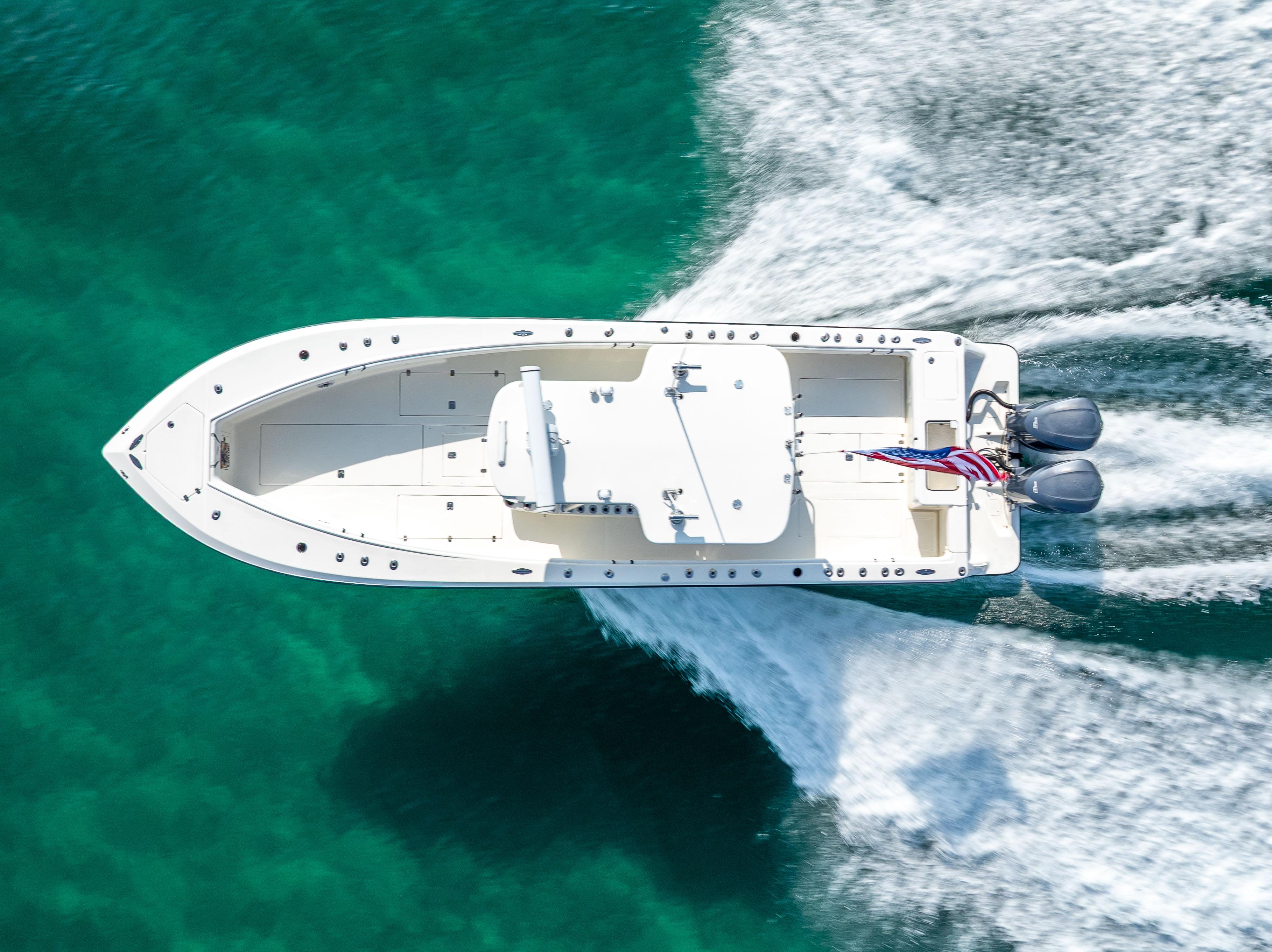 SeaVee-34 2014 -FL-US-2014 SeaVee 34 boat cruising on clear turquoise water, aerial view.-9825396 | Thumbnail