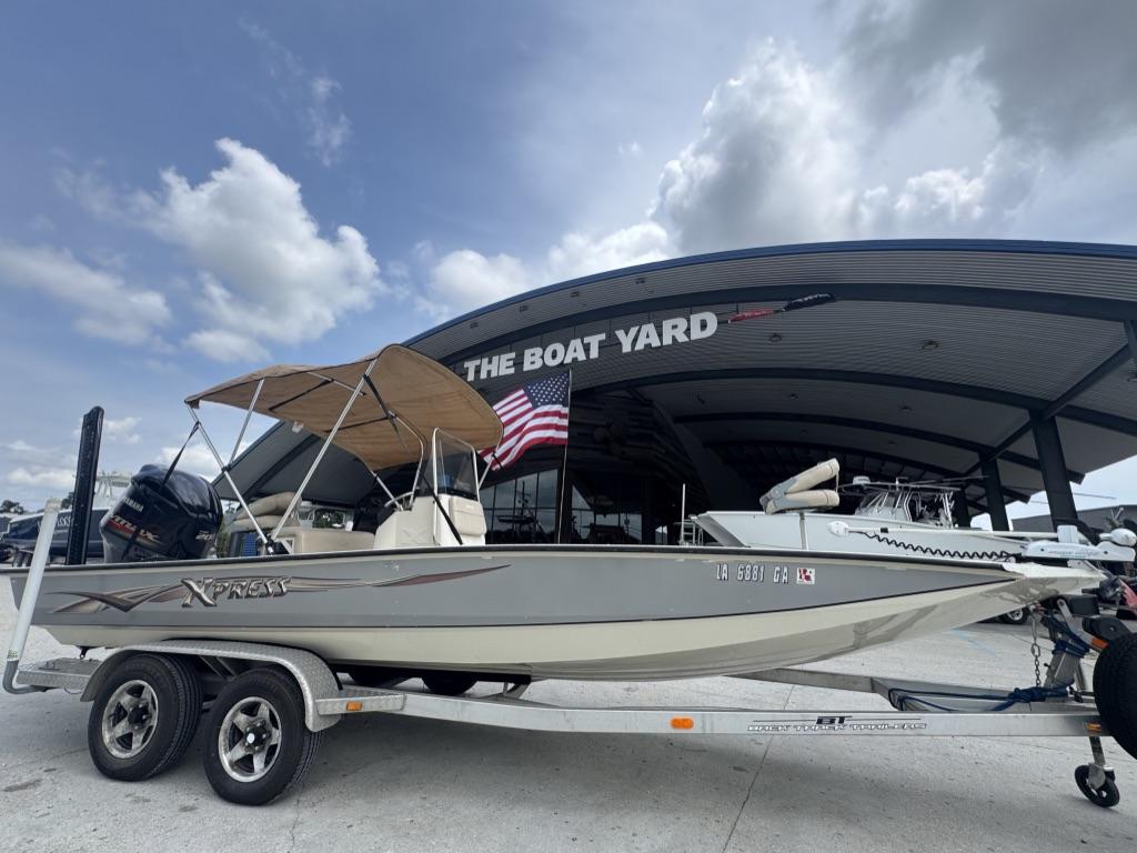 2013 Xpress Hyper-Lift Bay Series H22B boat on trailer at The Boat Yard.