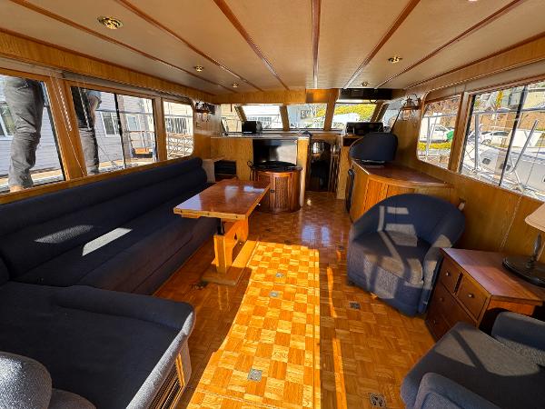 Luxurious interior of a 1991 Ocean Alexander 46 yacht with elegant wood finishes.
