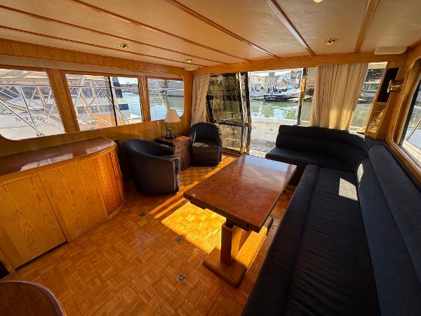 Luxurious interior of a 1991 Ocean Alexander 46 yacht with elegant wood finishes.