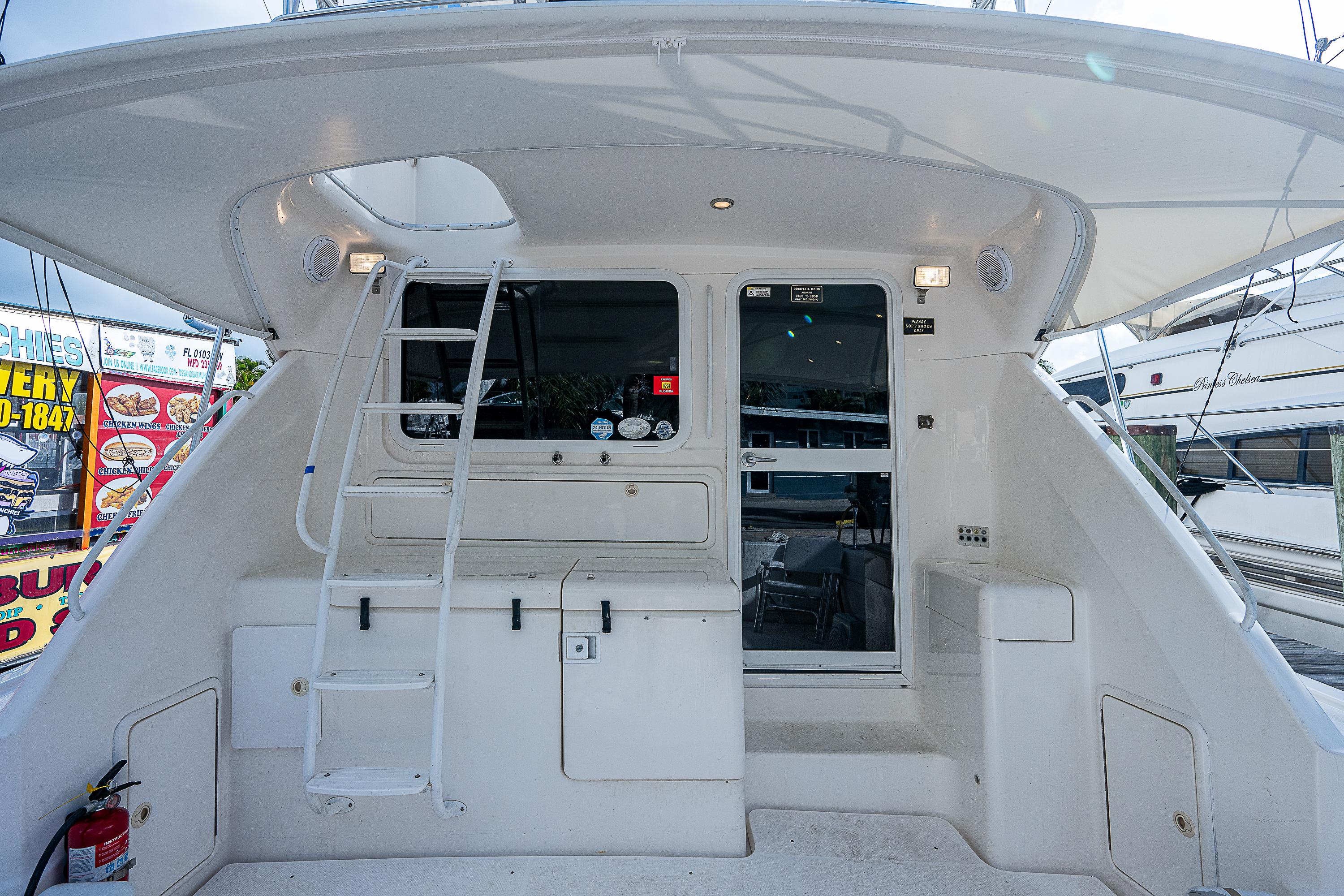 Riviera 42 Black Pearl - Cockpit, Entry to Salon