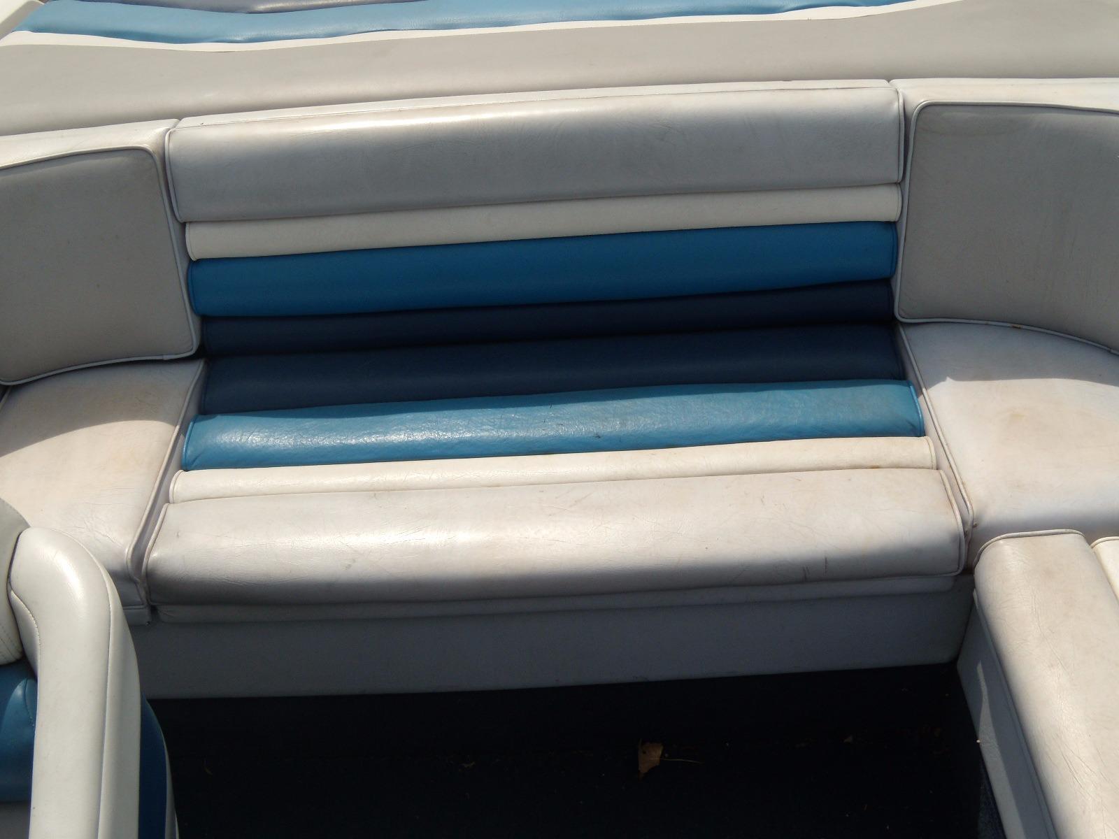 1989 Chaparral 2300 SX Sport boat seating with blue and white upholstery.