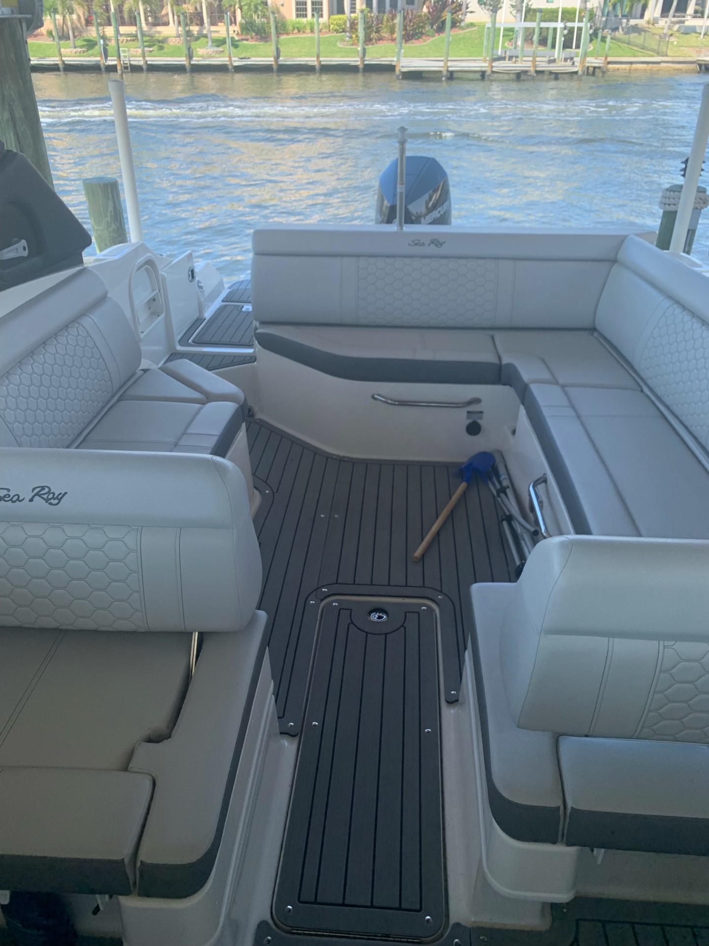 2021 Sea Ray SDX 270 Outboard boat interior with spacious seating and elegant design.