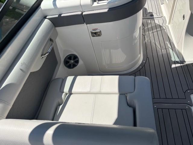 2021 Sea Ray SDX 270 Outboard interior with white seating and sleek design.