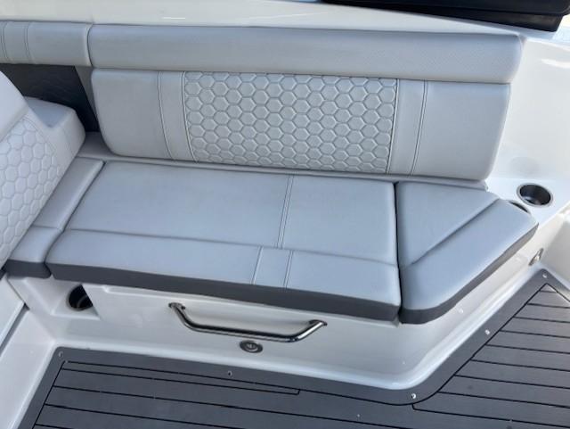 2021 Sea Ray SDX 270 Outboard boat seating with gray upholstery and hexagonal pattern.