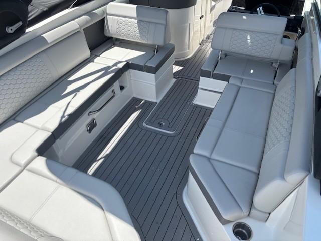 2021 Sea Ray SDX 270 Outboard interior with spacious seating and sleek design.