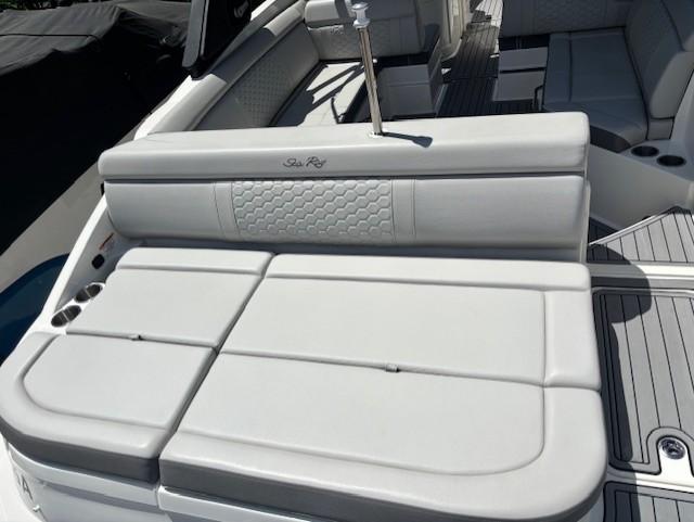 2021 Sea Ray SDX 270 Outboard boat interior with cushioned seating and sleek design.