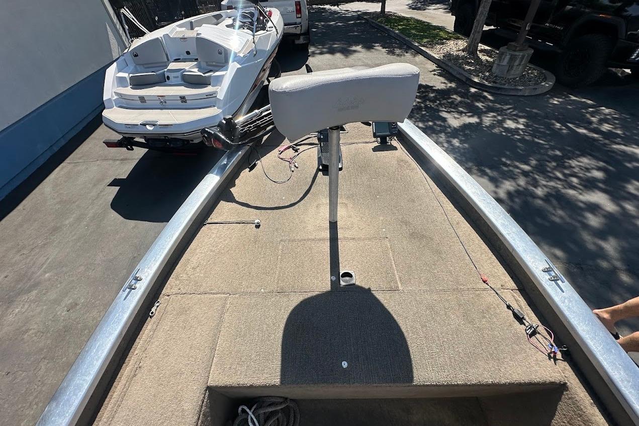 2001 Bass Tracker Pro Team 175 boat interior with seating and fishing setup.