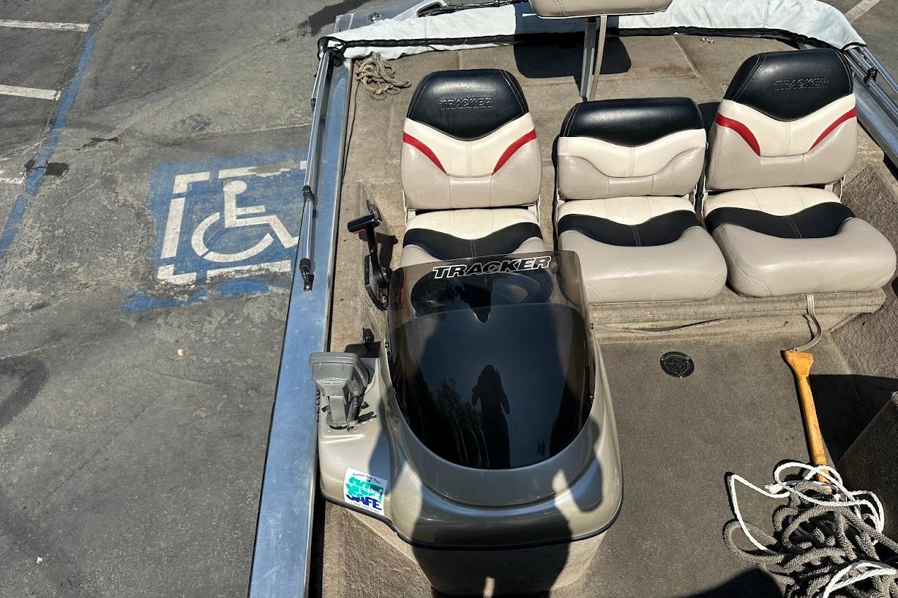 2001 Bass Tracker Pro Team 175 boat interior with seating and steering console.