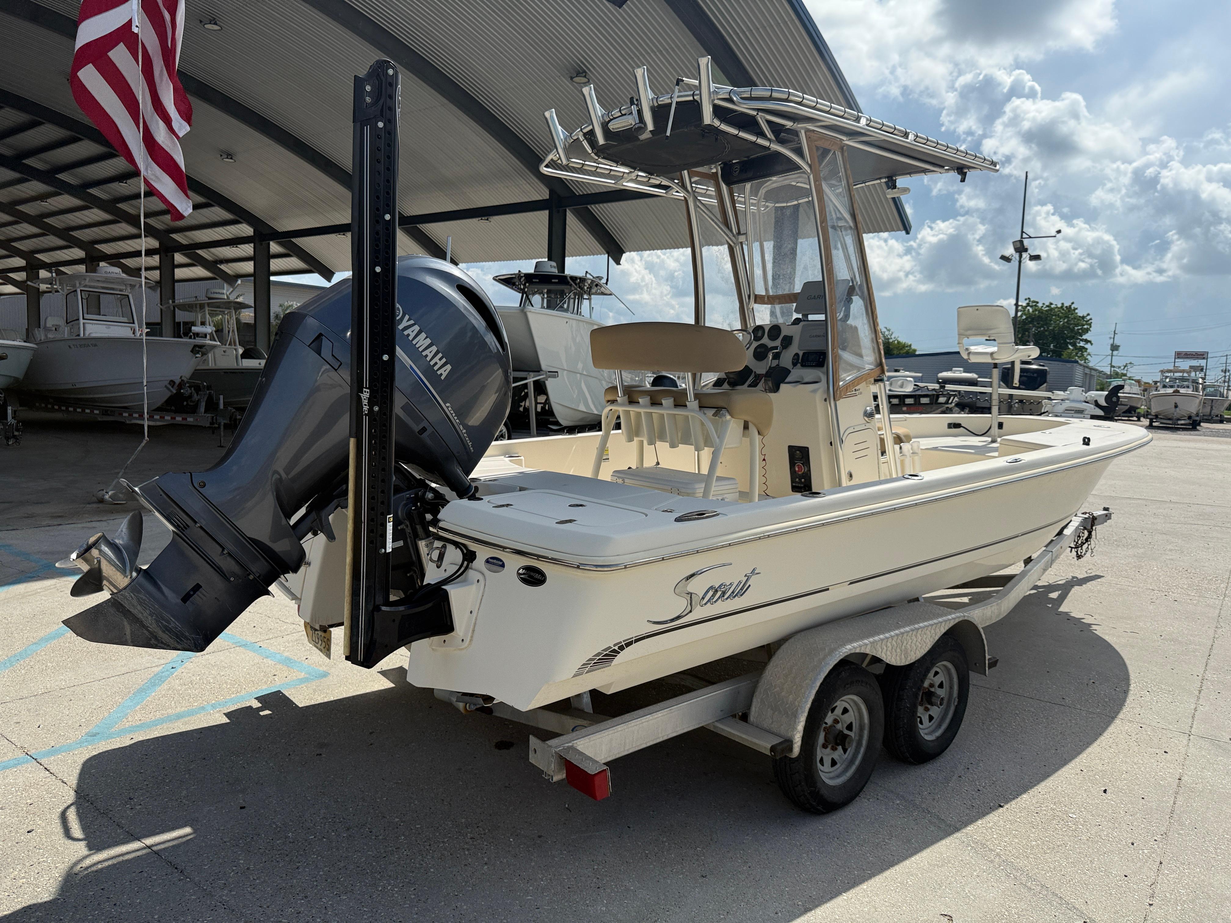 2014 Scout WINYAH BAY 221 boat on trailer with Yamaha outboard motor.