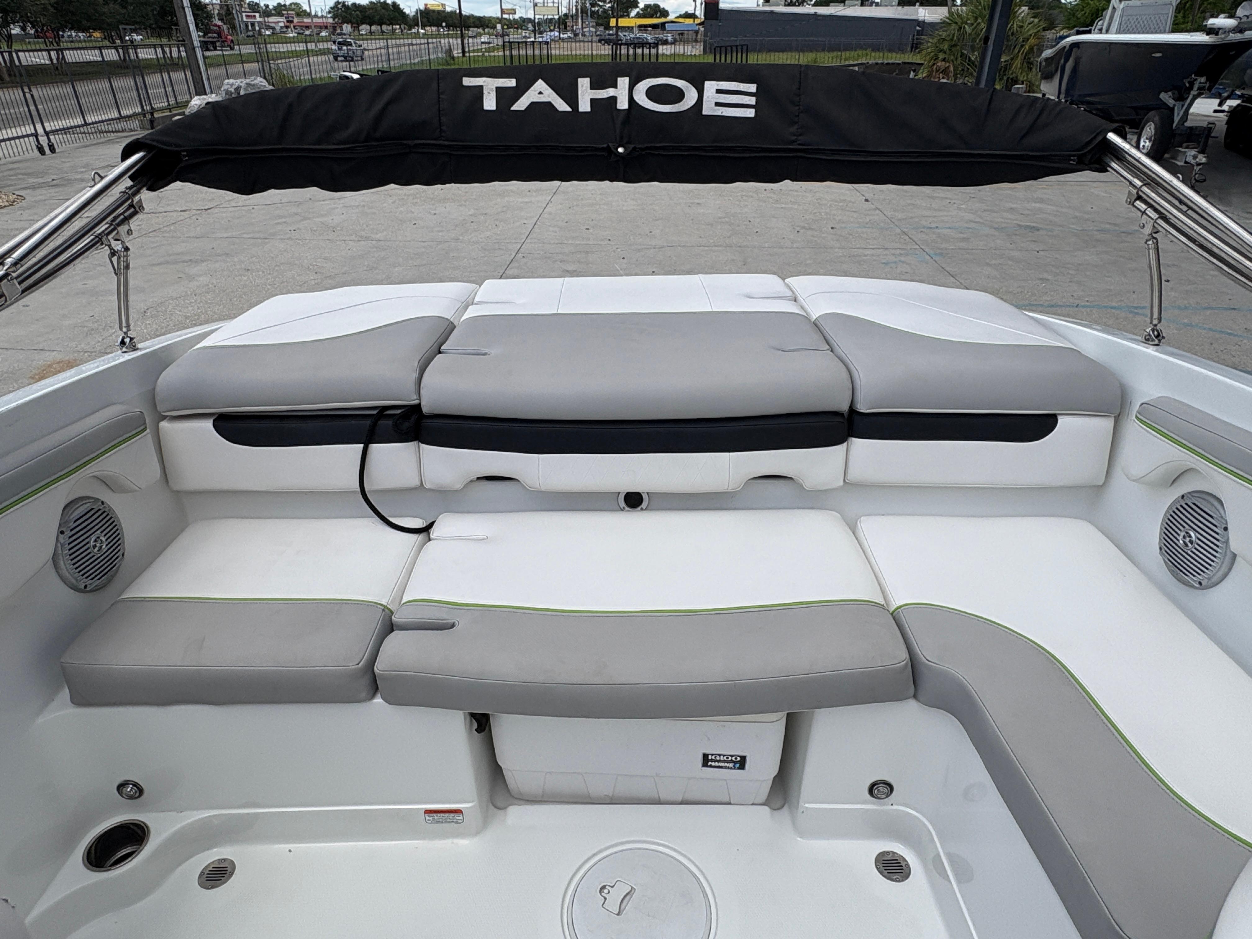 2019 Tahoe 700 boat interior with cushioned seating and canopy.