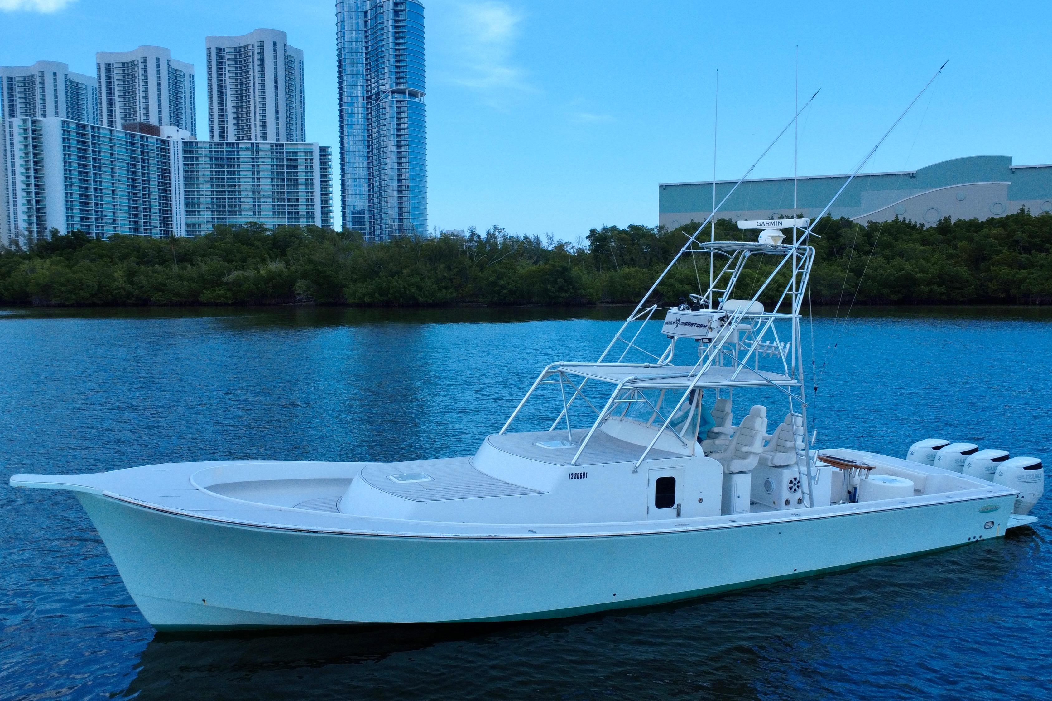 Chesapeake-53 Center Console 2017-Highly Migratory FL-US-2017 Chesapeake 53 Center Console boat on water with city skyline background.-9795522 | Thumbnail
