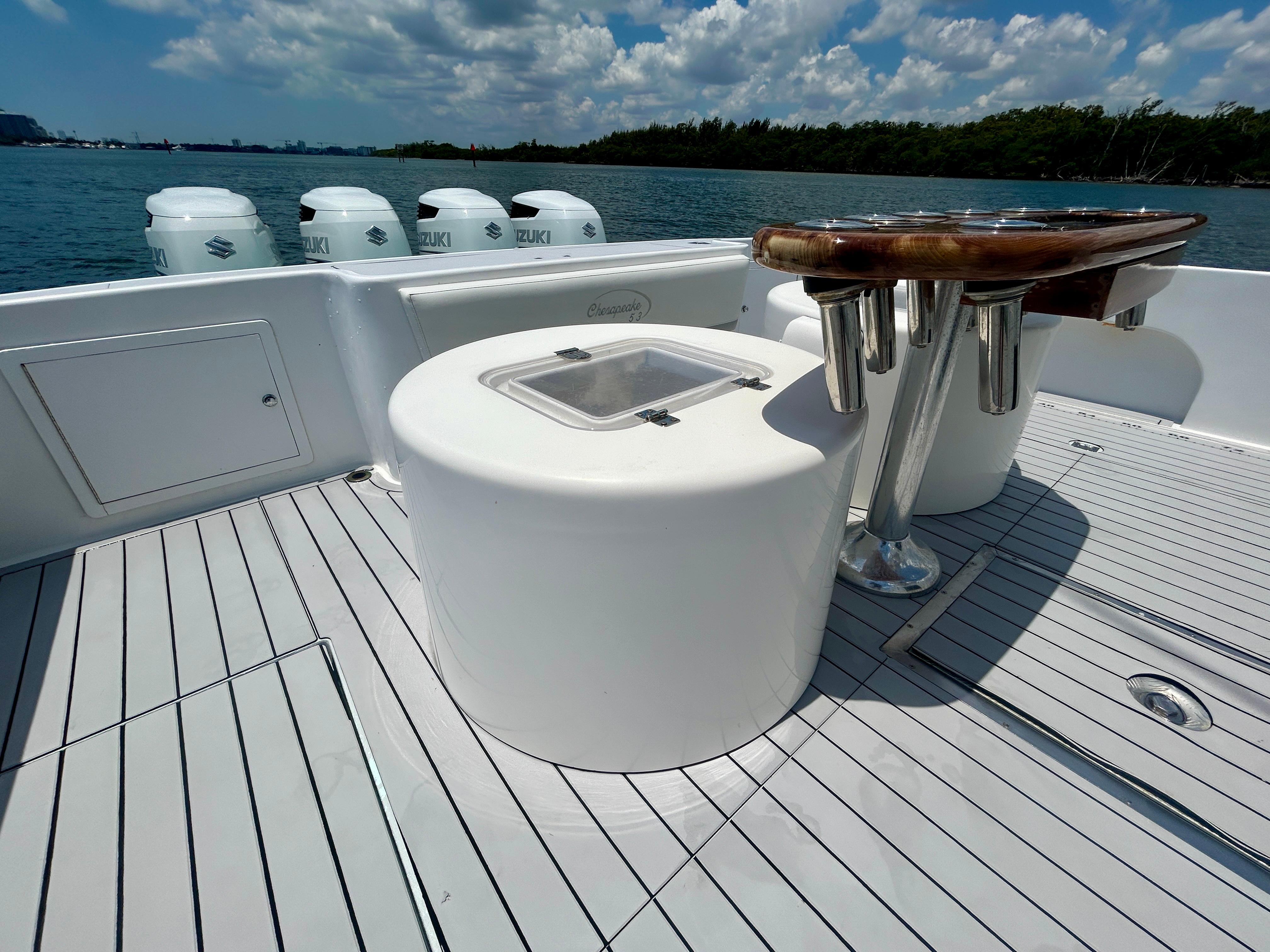 Chesapeake-53 Center Console 2017-Highly Migratory FL-US-2017 Chesapeake 53 Center Console boat deck with fishing rod holders and ocean view.-9795522 | Thumbnail