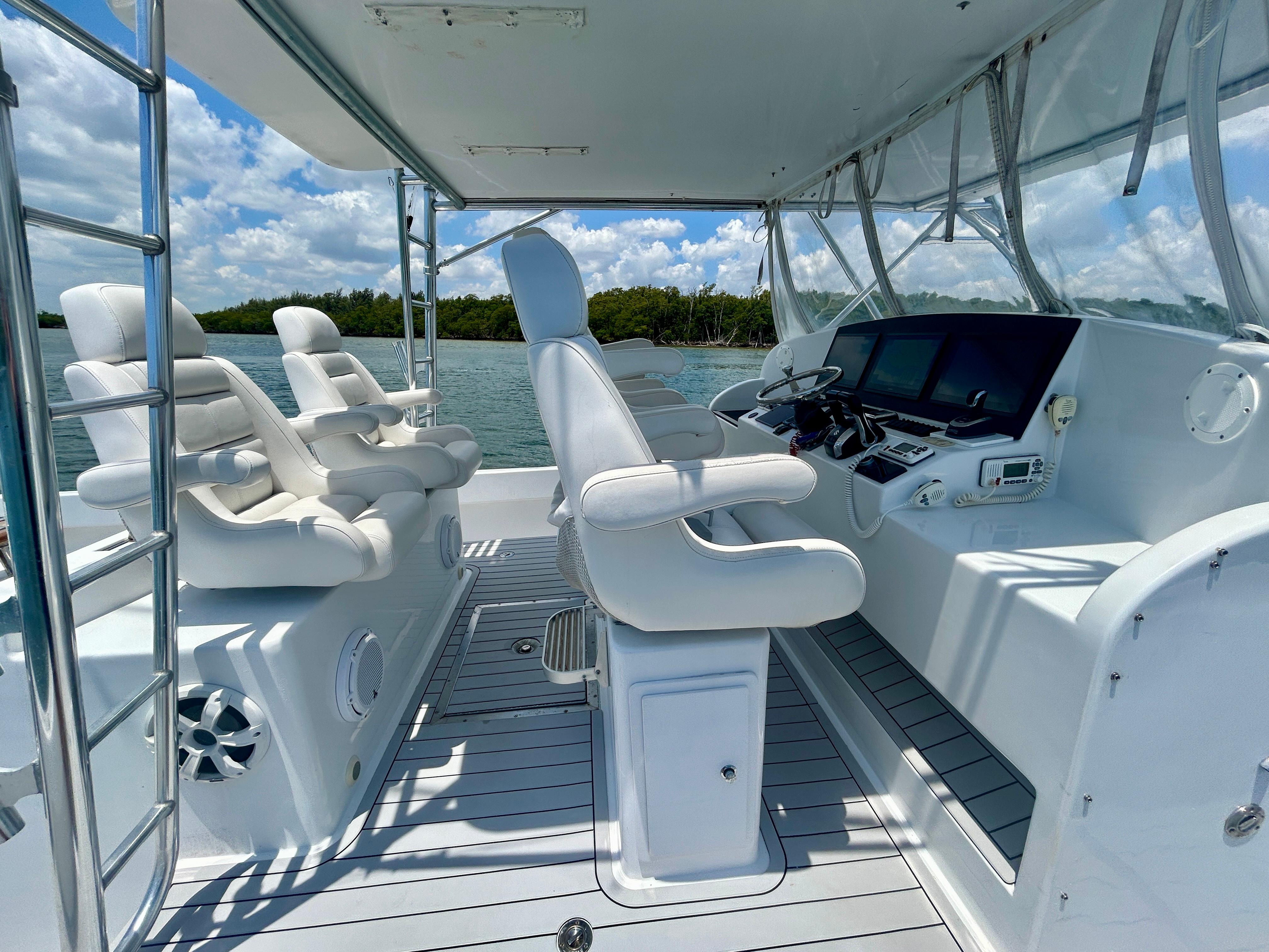 Chesapeake-53 Center Console 2017-Highly Migratory FL-US-2017 Chesapeake 53 Center Console boat interior with helm, seats, and navigation equipment.-9795522 | Thumbnail