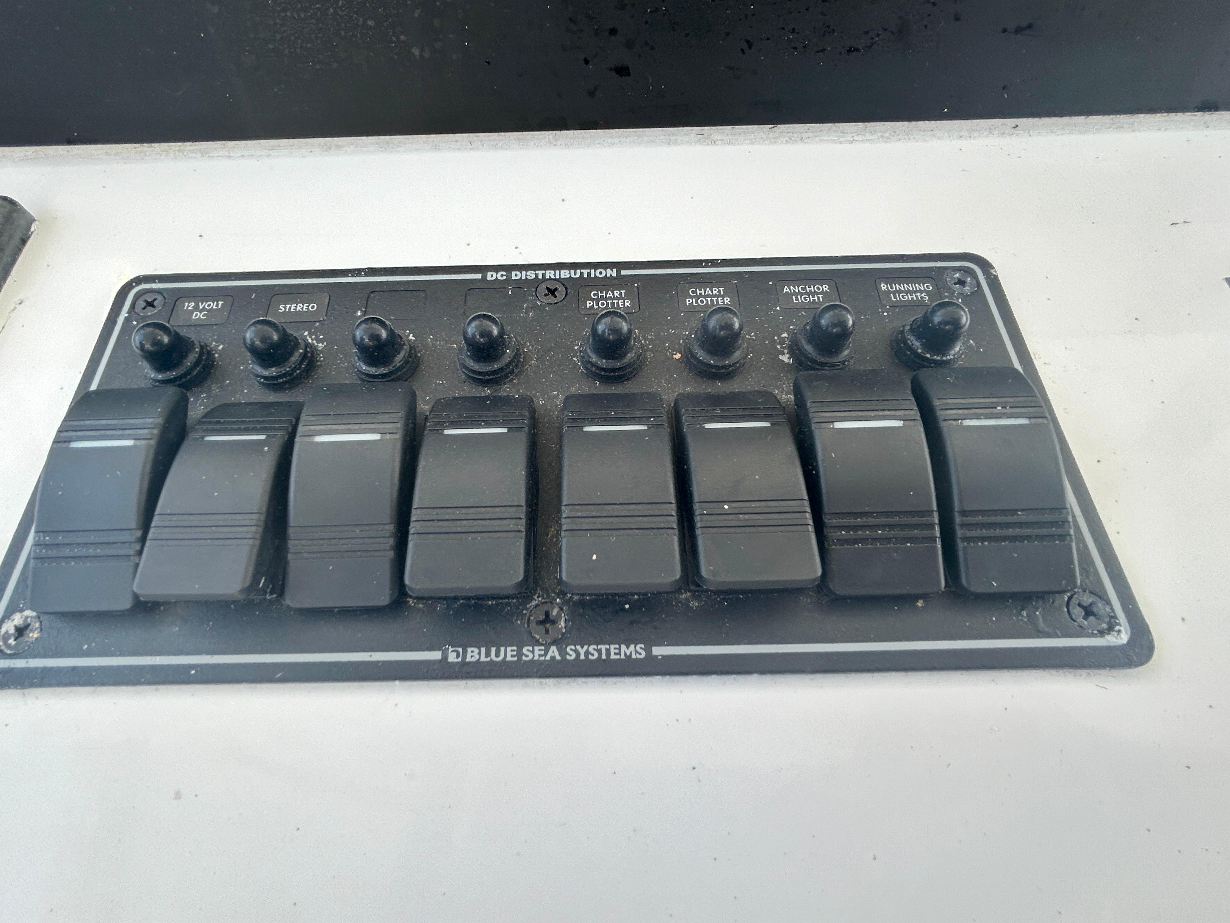 Chesapeake-53 Center Console 2017-Highly Migratory FL-US-Control panel of a 2017 Chesapeake 53 Center Console boat by Blue Sea Systems.-9795522 | Thumbnail