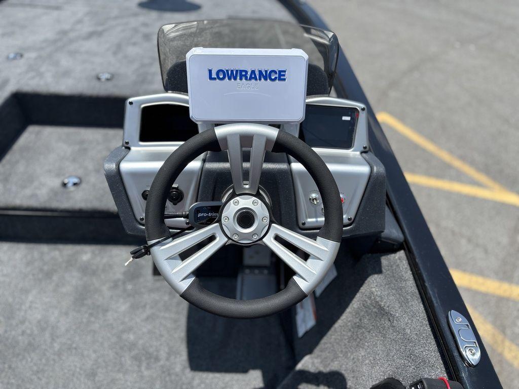 Steering wheel of 2025 Tracker SAVAGE™ 215 boat with Lowrance display.