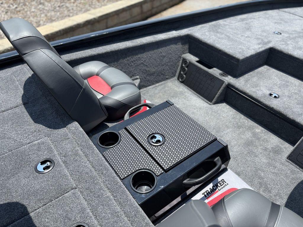 2025 Tracker SAVAGE™ 215 boat interior with seating and storage compartments.